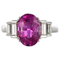 Modern 3.55 Carat Pink Sapphire and Baguette Cut Diamond Ring