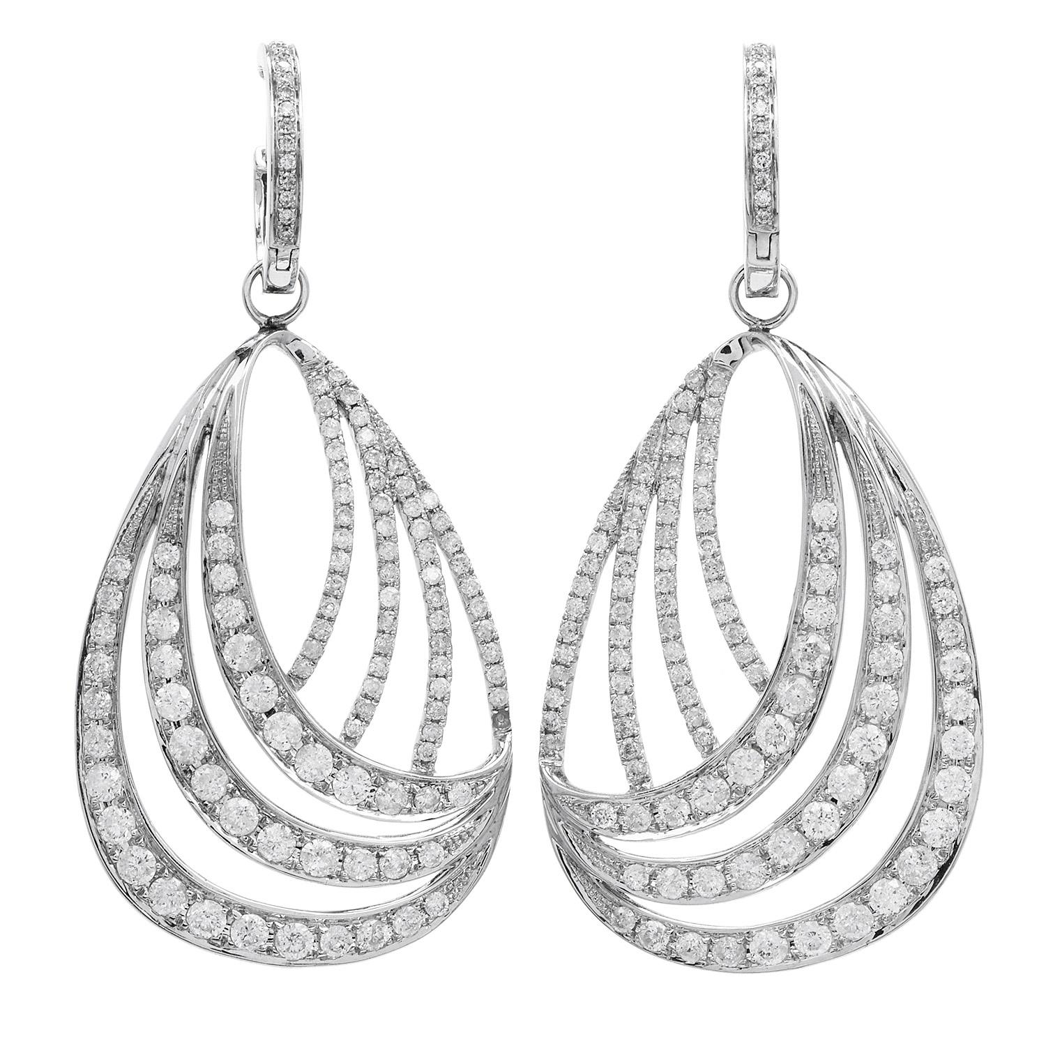 These Modern crossover design dangle drop earrings are shining bright!

Crafted in solid 14K White Gold, 

The open style earrings have two diamond-accented hoops with removable dangle jackets, for day & nightwear, two pairs in one!

Accented by 248