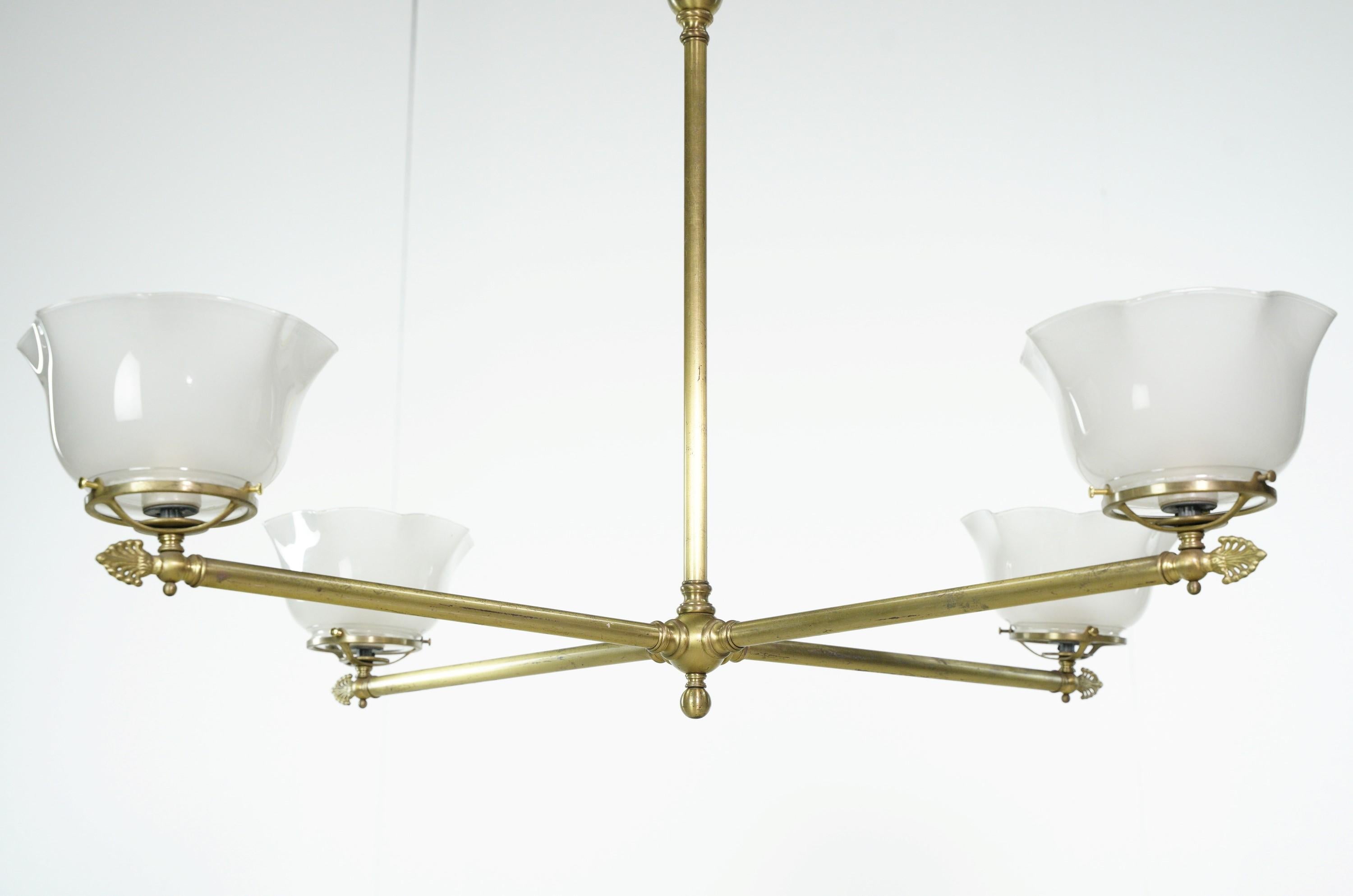 Modern 4 Arm Ruffled Glass Shades Brass Chandelier In Good Condition For Sale In New York, NY