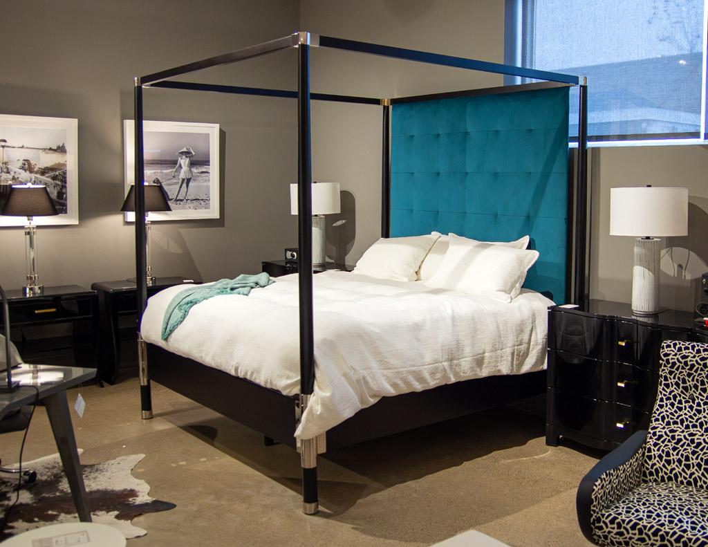 This Modern 4 Poster King Size Bed is the perfect choice for those looking for a delicate balance between modern and traditional styling. The frame of this bed is crafted from solid oak wood in a satin black lacquer finish, accented with polished