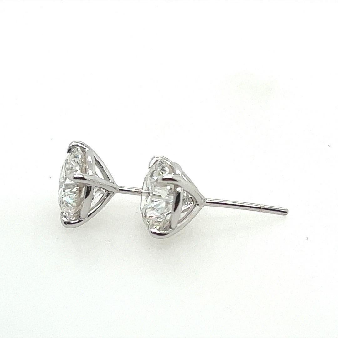 Modern 4.13 Carat Natural GIA Certified F Color Round Brilliant Diamond Earrings 3