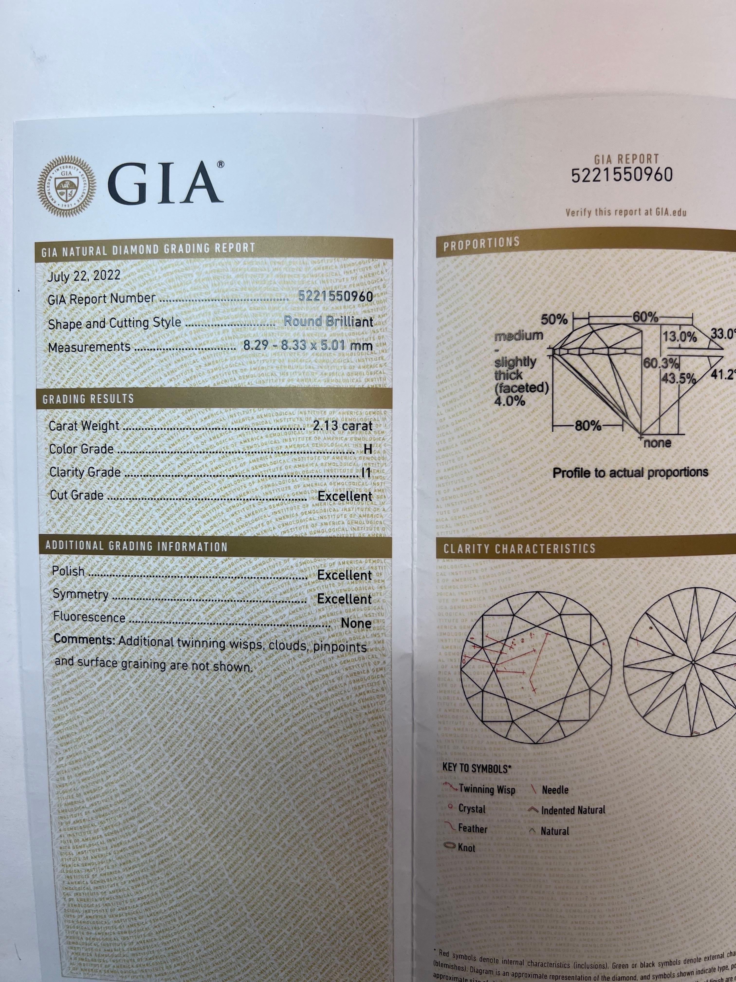 Modern 4.24 Carat Natural GIA Certified H-I Color Round Brilliant Diamond Studs. The diameter of these diamonds are 8.2mm, making it face-up larger than the average two carat round. 

The first stone is a 2.11 carat I I1, Excellent Cut, Polish and