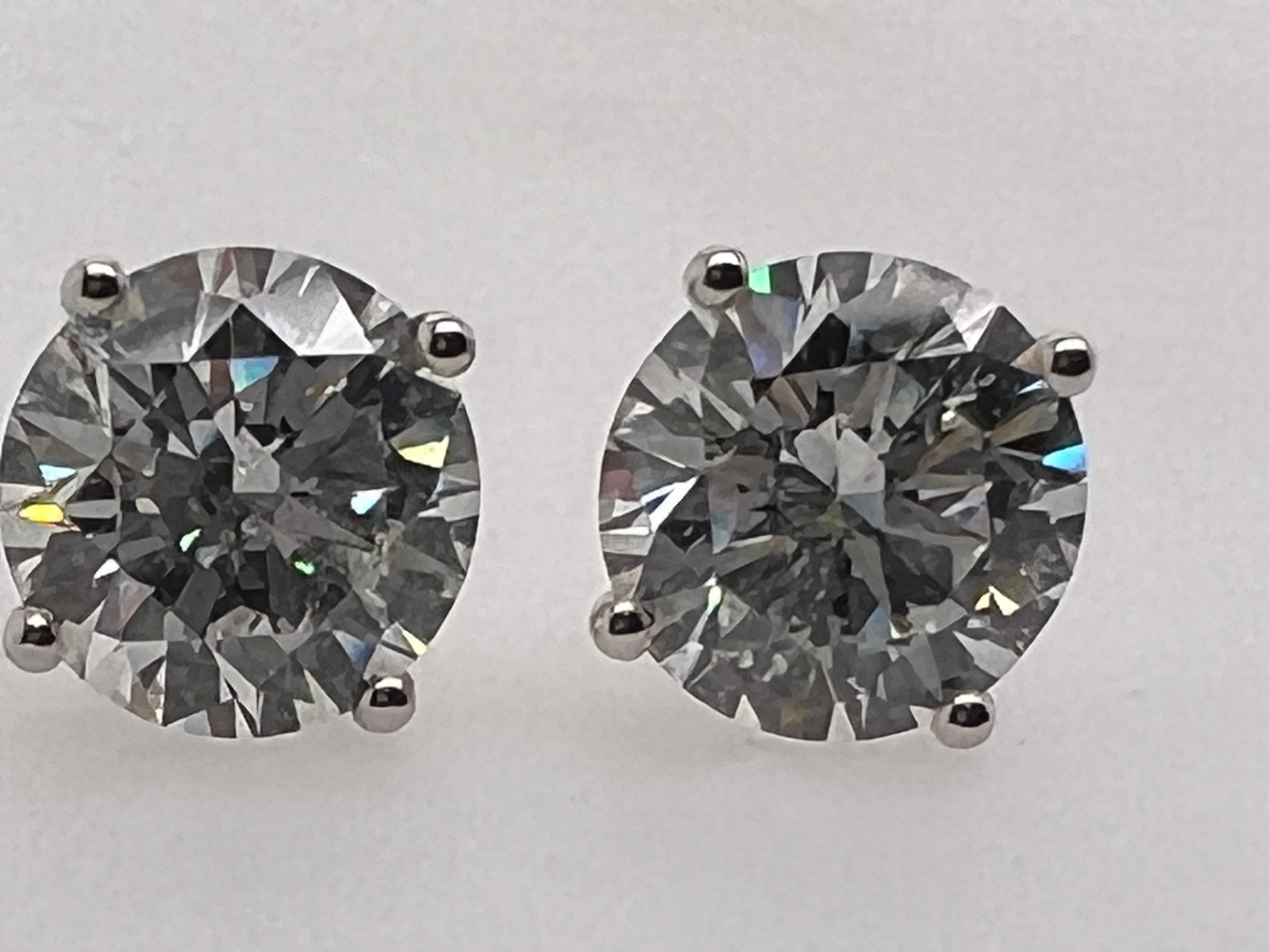 Modern 4.24 Carat Natural GIA Certified H-I Color Round Brilliant Diamond Studs  1