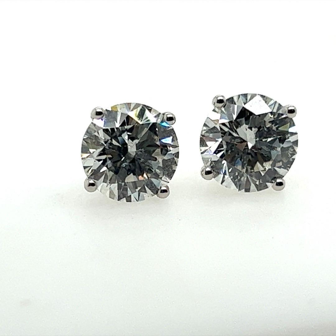 Modern 4.24 Carat Natural GIA Certified H-I Color Round Brilliant Diamond Studs  2