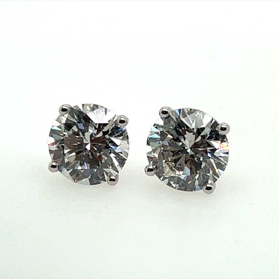 Modern 4.24 Carat Natural GIA Certified H-I Color Round Brilliant Diamond Studs  4