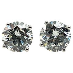 Modern 4.24 Carat Natural GIA Certified H-I Color Round Brilliant Diamond Studs 