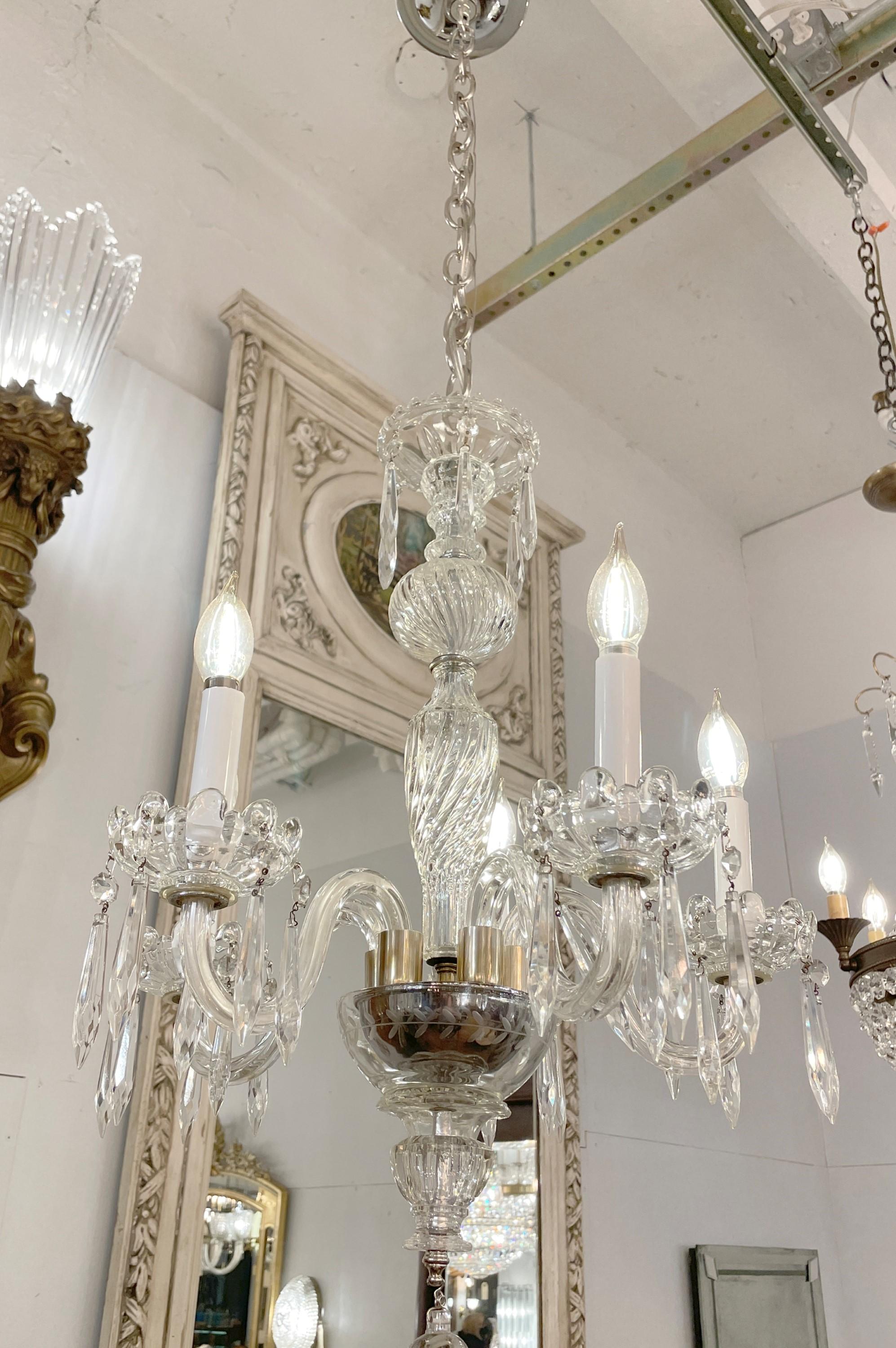Modern style clear crystal framed five arm chandelier with chrome over brass base, chain, and canopy. Cleaned and restored. This light is wired and ready to ship. Please note, this item is located in one of our NYC locations.