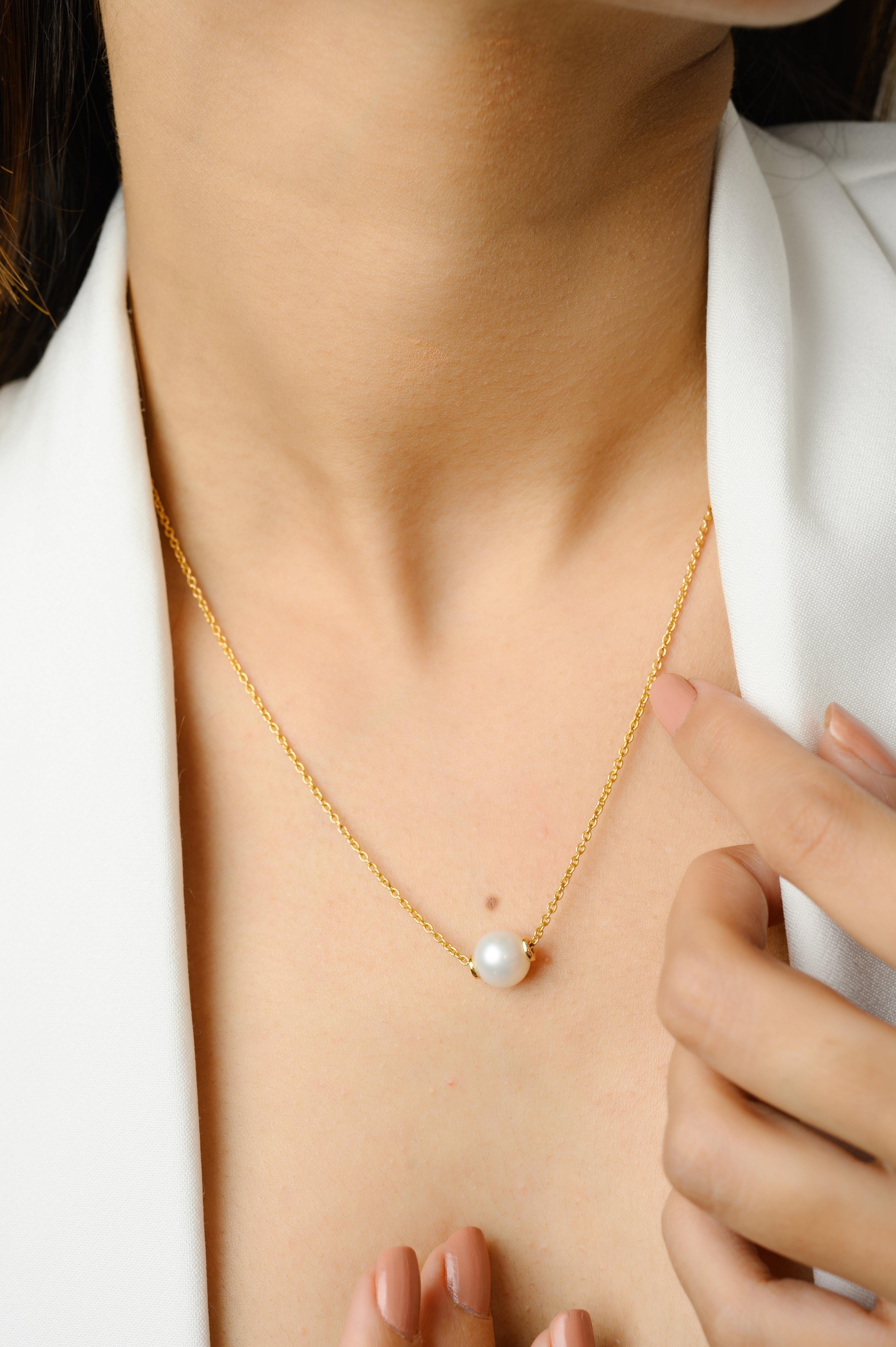 Modern 5 Carat Single Pearl Chain Necklace in 18K Gold with round bead pearl. This stunning piece of jewelry instantly elevates a casual look or dressy outfit. 
Pearl symbolizes purity, determination and perfection. 
Designed with round pearl bead