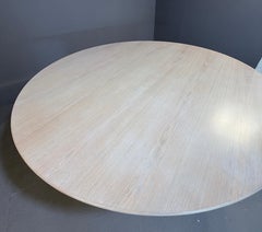 Modern 6 foot diameter dining table in variety of wood species by Aaron Saxton