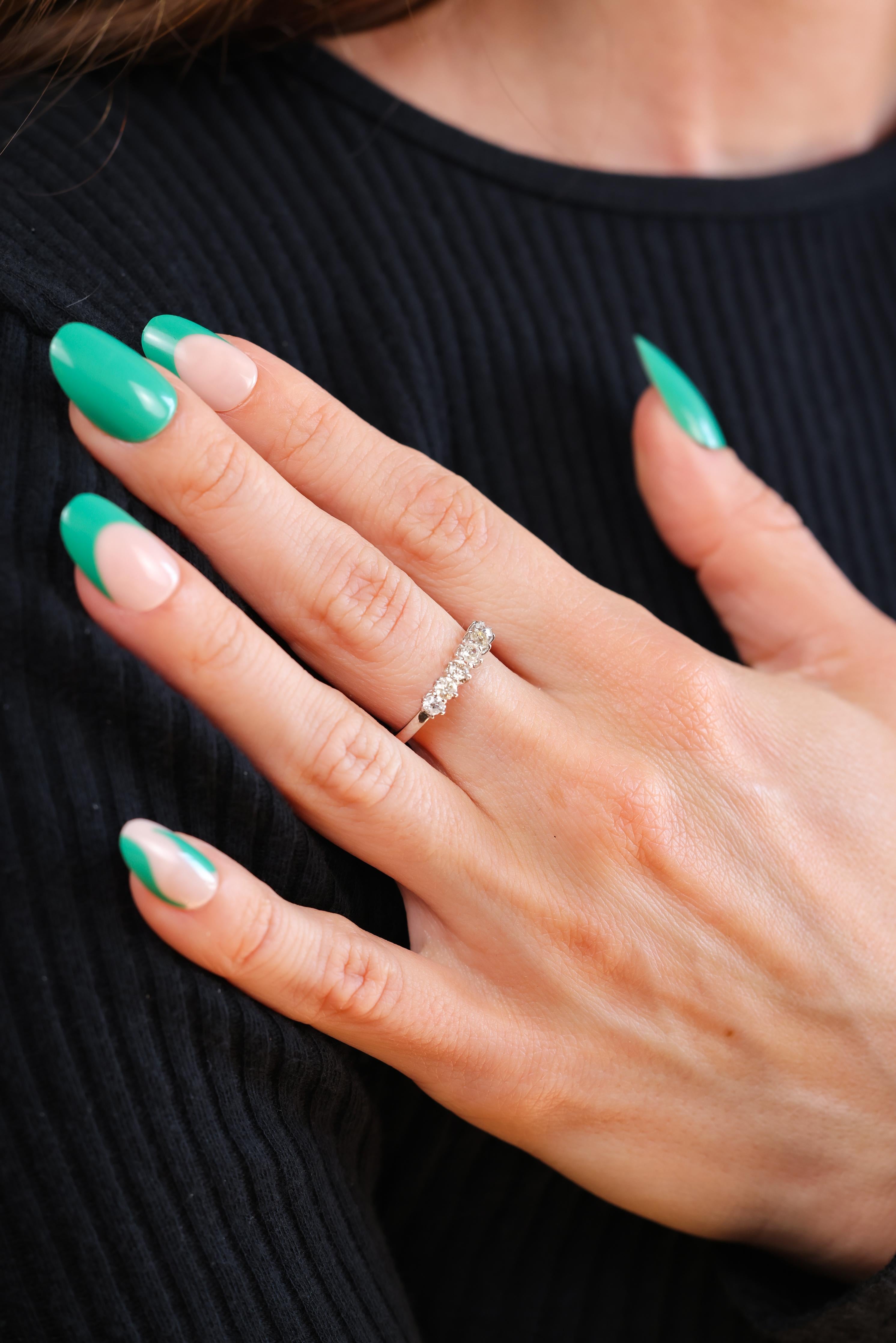 Center Stone: 6 diamonds
Cut: Old European
Weight: 0.55 carats
Color: J-K 
Clarity: I1
Metal: Platinum 
Era: Modern
Circa: 2023
Hallmarks: Purity marks
Size: 6-1/4 and can be resized 
Gram weight: 4.3
 
Radiating timeless elegance and modern