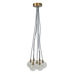 Modern 7-Light Cluster Chandelier with Oversized Glass Globes and Satin Brass