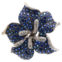 Modern 9 carat sapphire diamond 18k white gold flower brooch