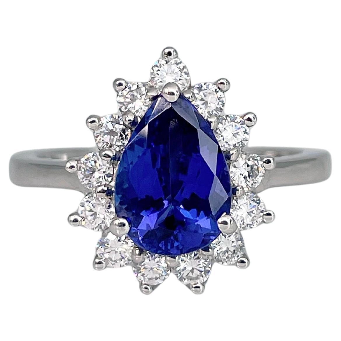 Modern 950 Platinum 2 Carat Pear Cut Tanzanite 0.60 Carat Diamond Cluster Ring