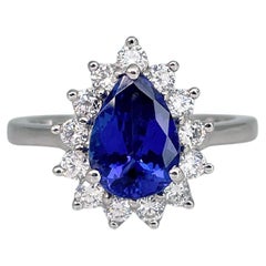 Modern 950 Platinum 2 Carat Pear Cut Tanzanite 0.60 Carat Diamond Cluster Ring
