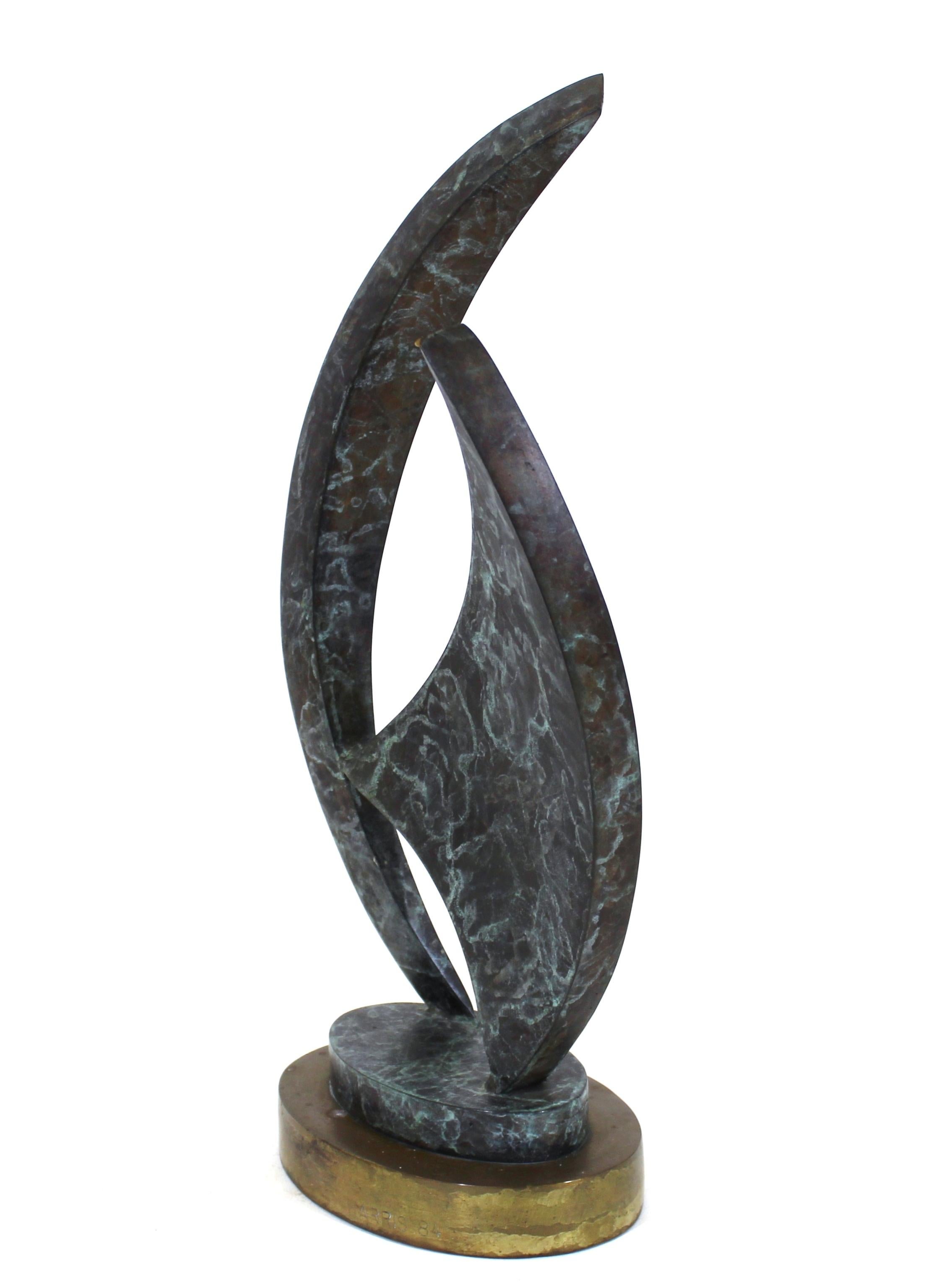 Modern abstract tabletop sculpture in patinated bronze, marked 'Harris 84' on the base.