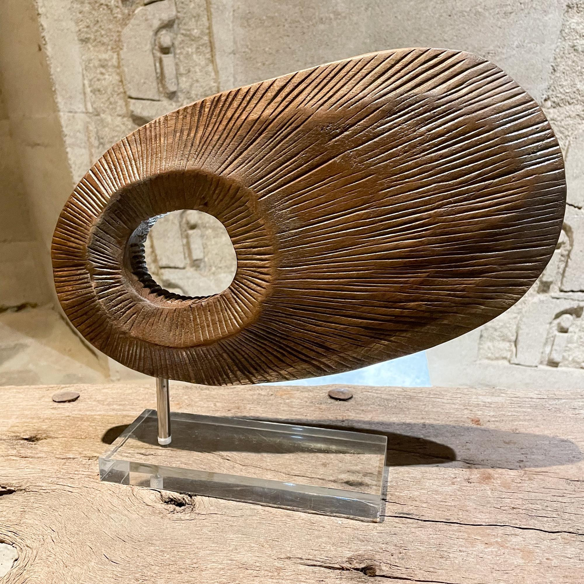 Modern abstract disc sculpture carved walnut wood on rectangular Lucite base 1970s Mexico City
Table sculpture is unmarked.
Measures:11.5 H x 14 W x 3 D inches
Preowned Unrestored Vintage Presentation and Condition.
Refer to our images