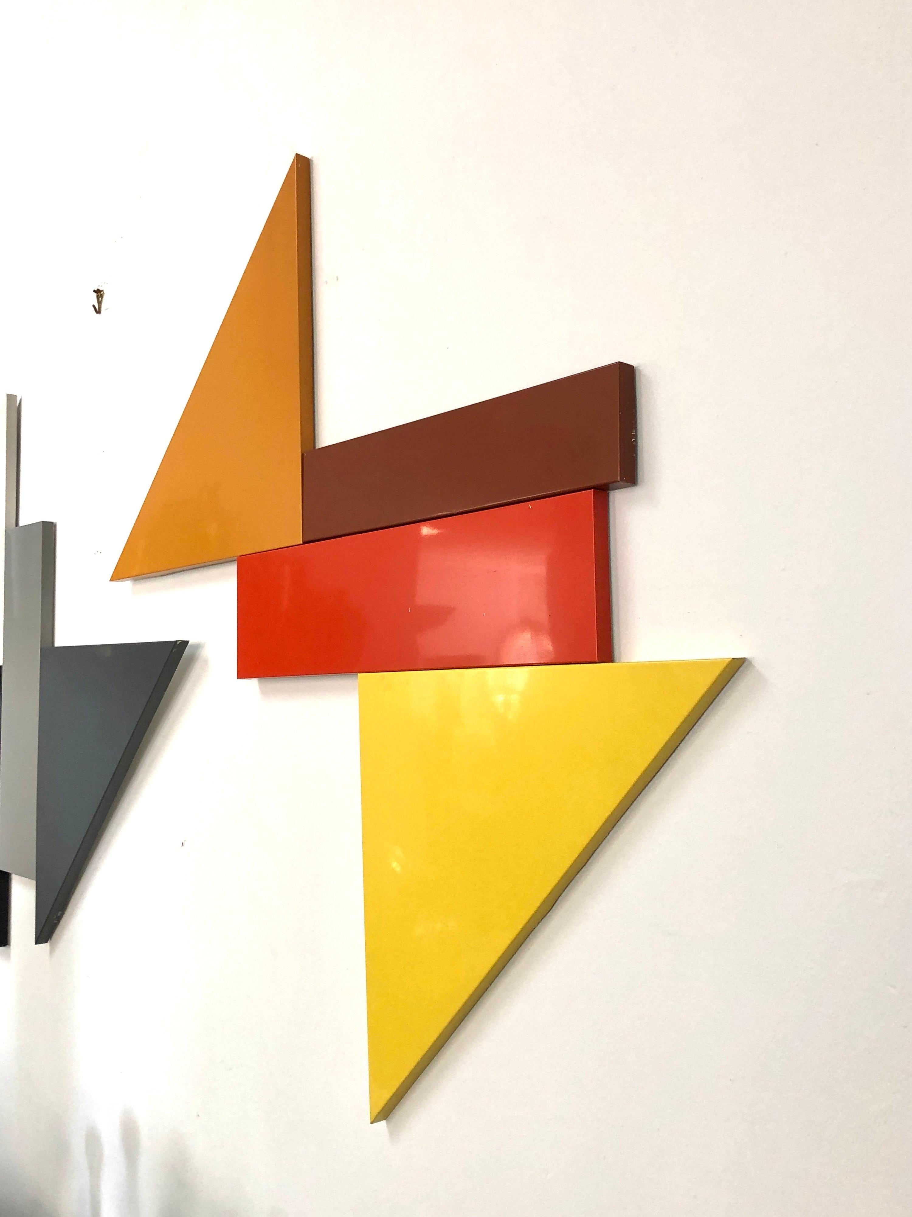 Each set consists of 4 pieces. There are 3 different color combos. The pieces attach to each other with clips on the back and can be arranged on multiples ways. Sets can be combined to  create a larger piece of art. We have 4 sets of each color. 