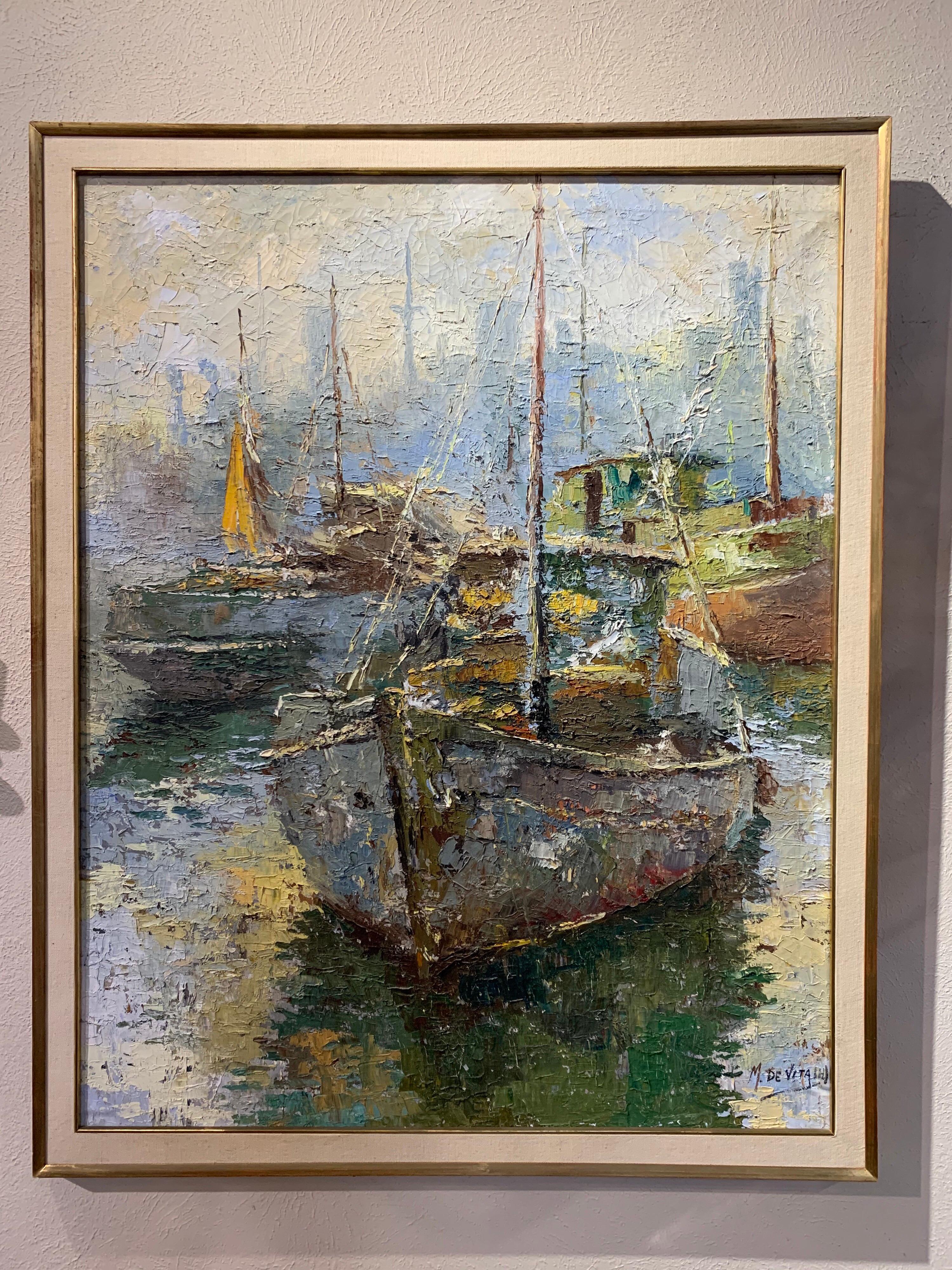 Lovely modern painting of a harbor and boats in a nice frame. Signed by M Devita.