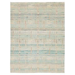 Moderner, abstrakter Wollteppich mit Karomuster in den Farben Pastell-Aqua, Salbei und warmem Terrakotta, 9 x 12