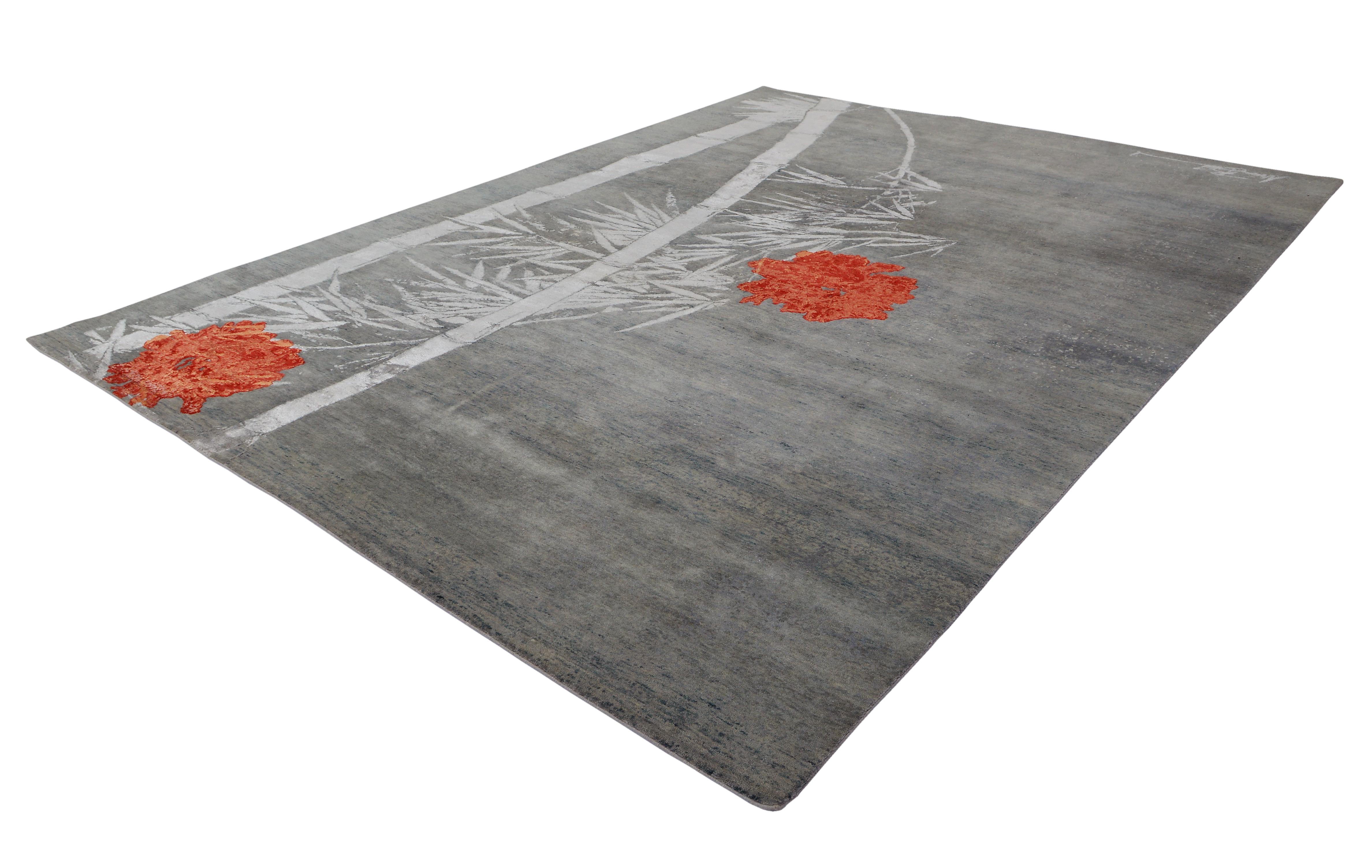 A new addition to the handmade rugs in the abstract rug line by Rug & Kilim, this 9' x 12'3” modern rug is hand knotted in a unique, proprietary blend of quality wool and silk, the natural luster of the latter bringing out transitional hues of