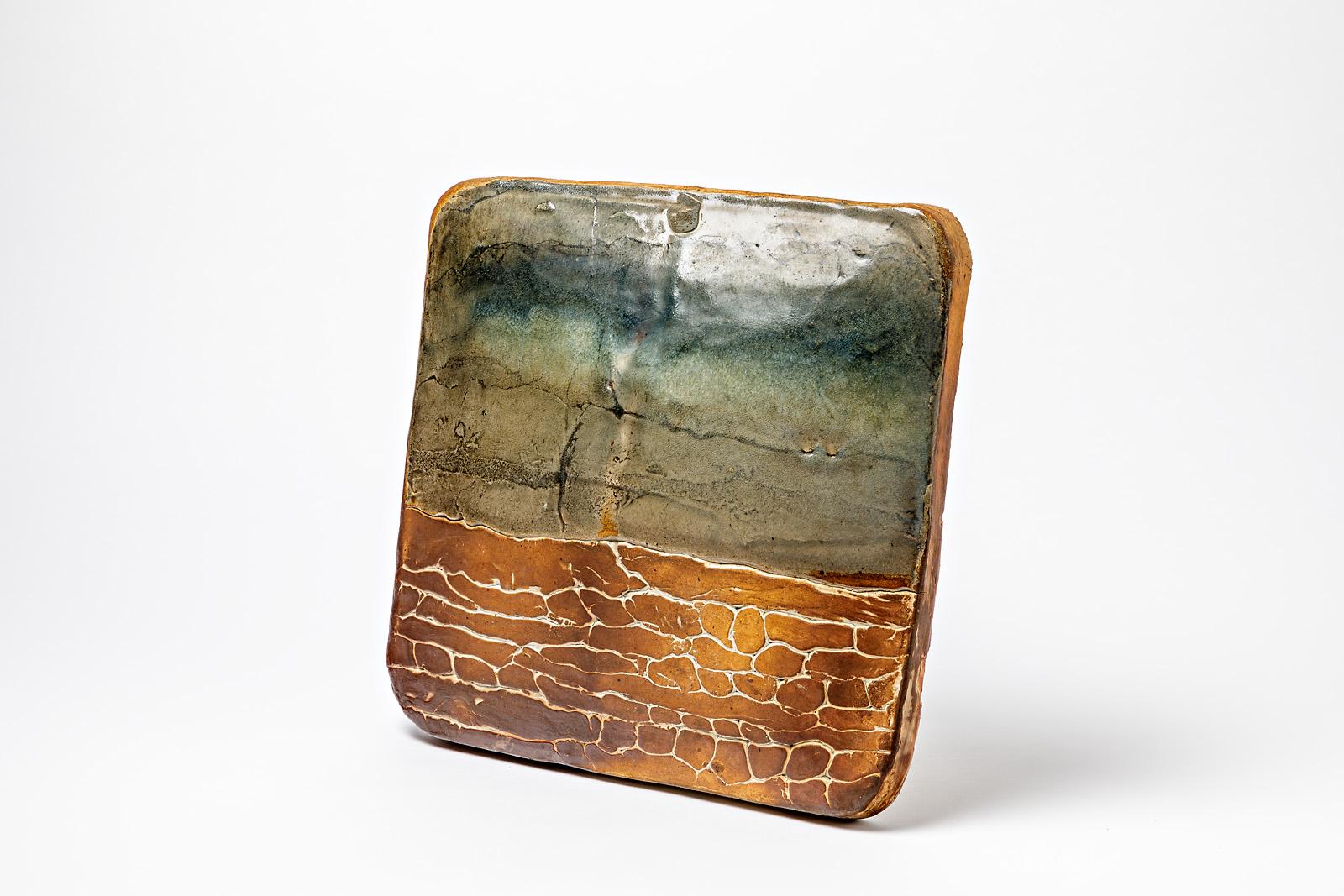 Thimonnier B.

Abstract stoneware ceramic wall sculpture by french artist.

Elegant ceramic glaze colors.

Signed: THIMONNIER

Realised circa 1980.

Wall fixations.

Dimensions: 40 x 40 x 6cm.