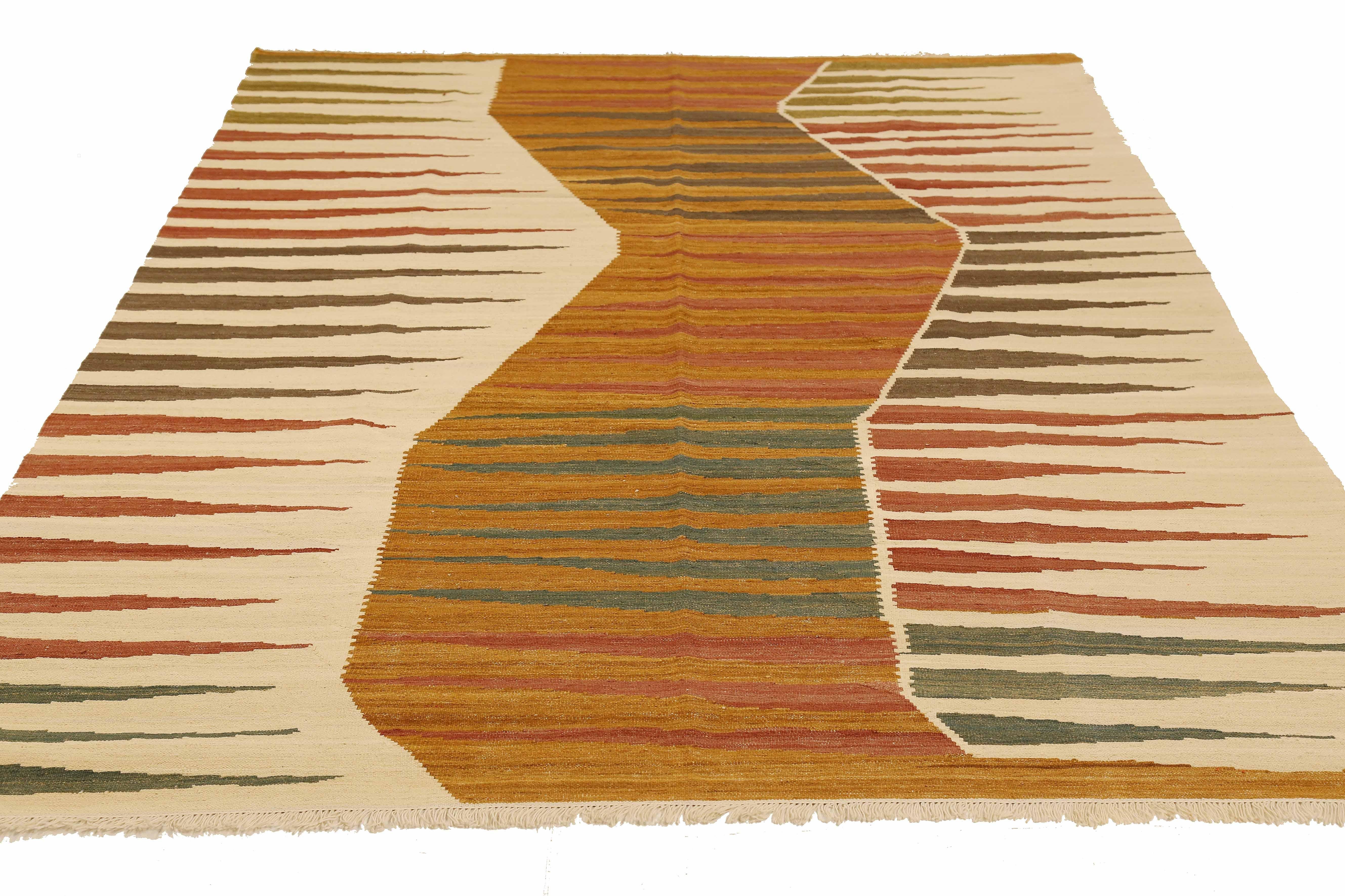 Afghan rug handwoven from the finest sheep’s wool and colored with all-natural vegetable dyes that are safe for humans and pets. It’s a traditional Kilim flat-weave design featuring elegant alternating patterns of red, navy and orange geometric