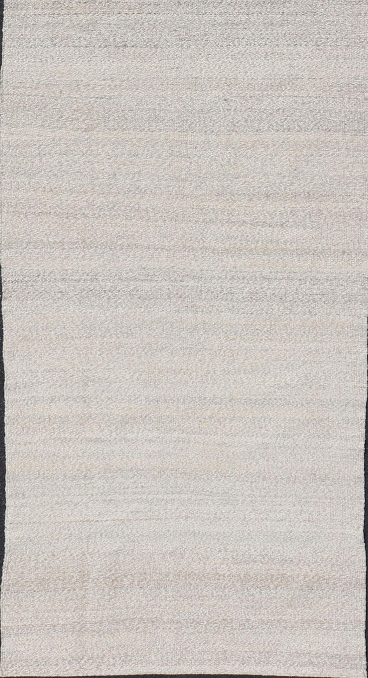 Flat-weave Kilim runner in shades of grey and cream, rug AFG-31757, country of origin / type: Afghanistan / Kilim

This muted piece features an all-over design that evokes casual and easy vibes. Perfect for modern design projects and well-suited