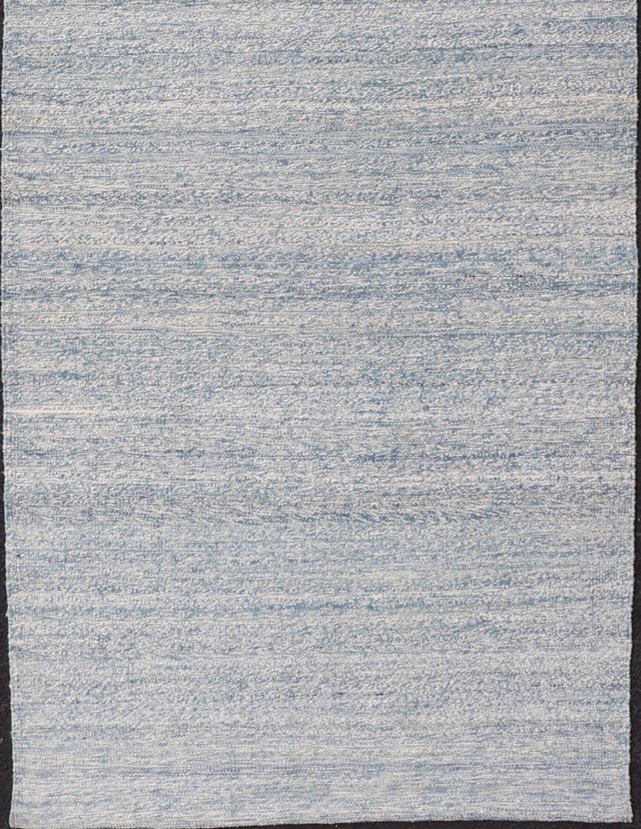 Flat-weave Kilim rug with all-over in shades of cream and blue,  Keivan Woven Arts/rug/ AFG-31760, country of origin / type: Afghanistan / Kilim

Measures: 3'1 x 9'7

This minimalist piece evokes casual and easy vibes. Perfect for modern interior