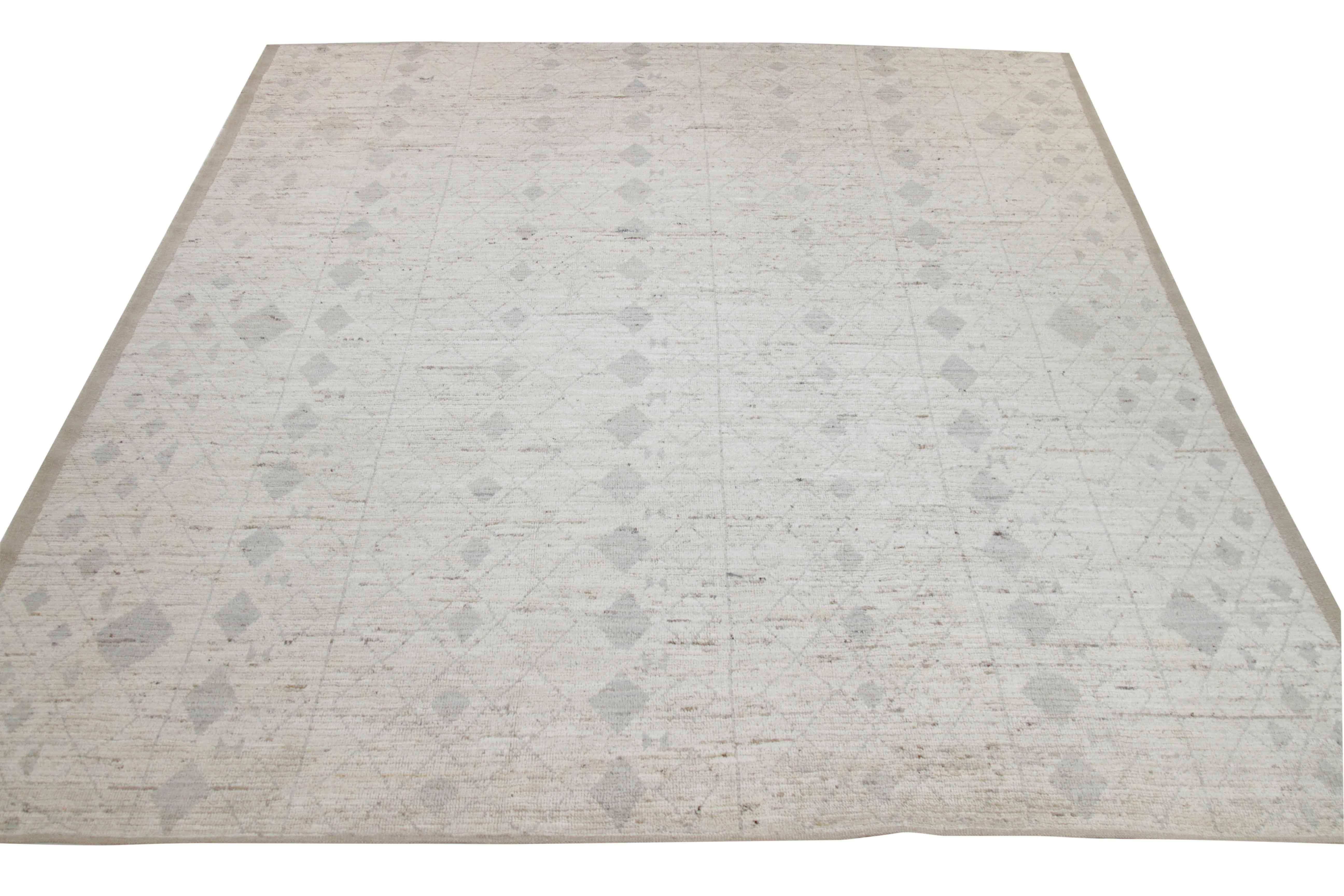 Modern Afghan rug handwoven from the finest sheep’s wool. It’s colored with all-natural vegetable dyes that are safe for humans and pets. This piece is a traditional Afghan weaving featuring a Moroccan inspired design. It’s highlighted by gray