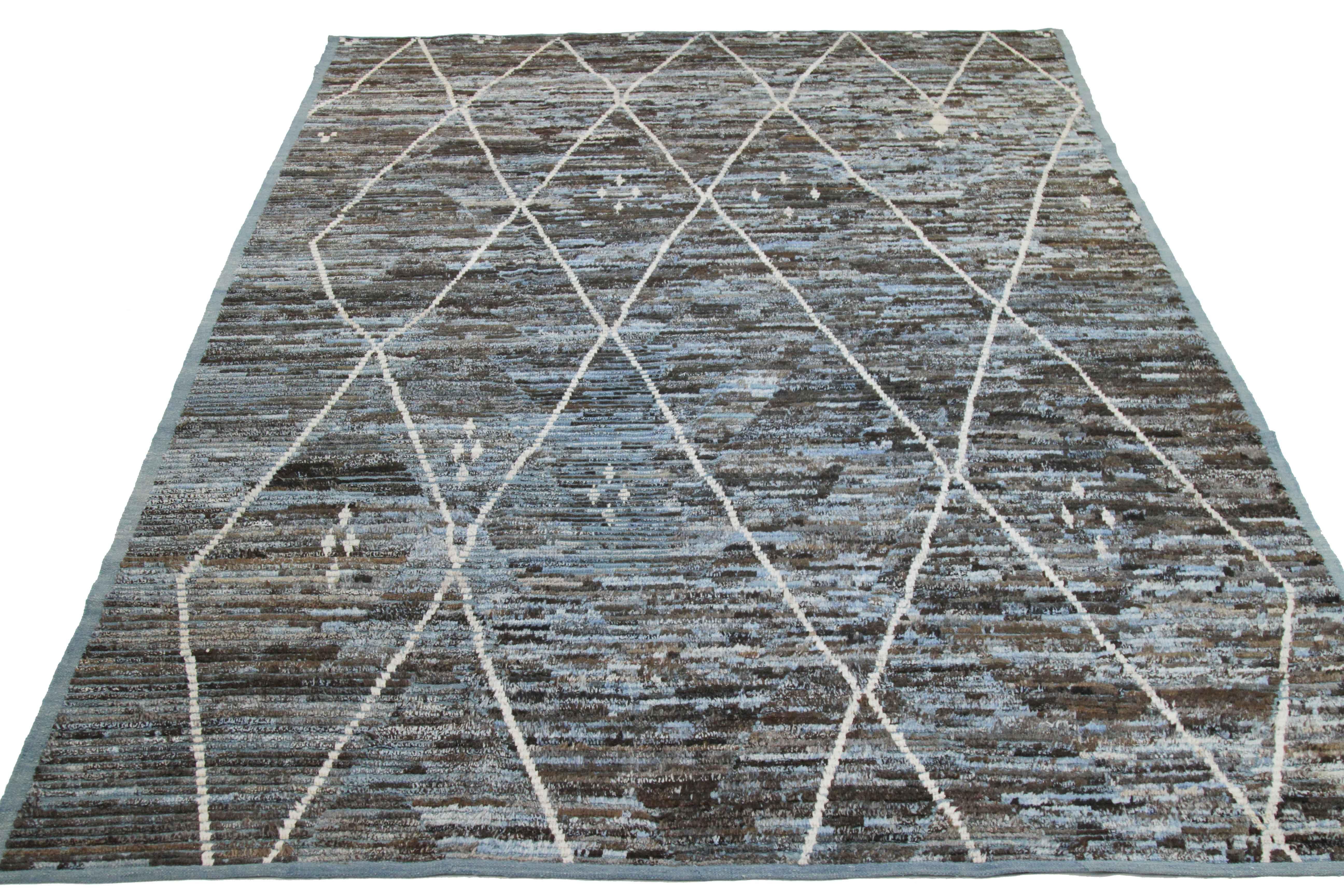 Modern Afghan rug handwoven from the finest sheep’s wool and colored with all-natural vegetable dyes that are safe for humans and pets. It’s a traditional Afghan weaving featuring a Moroccan inspired design highlighted by white lines over a mix of