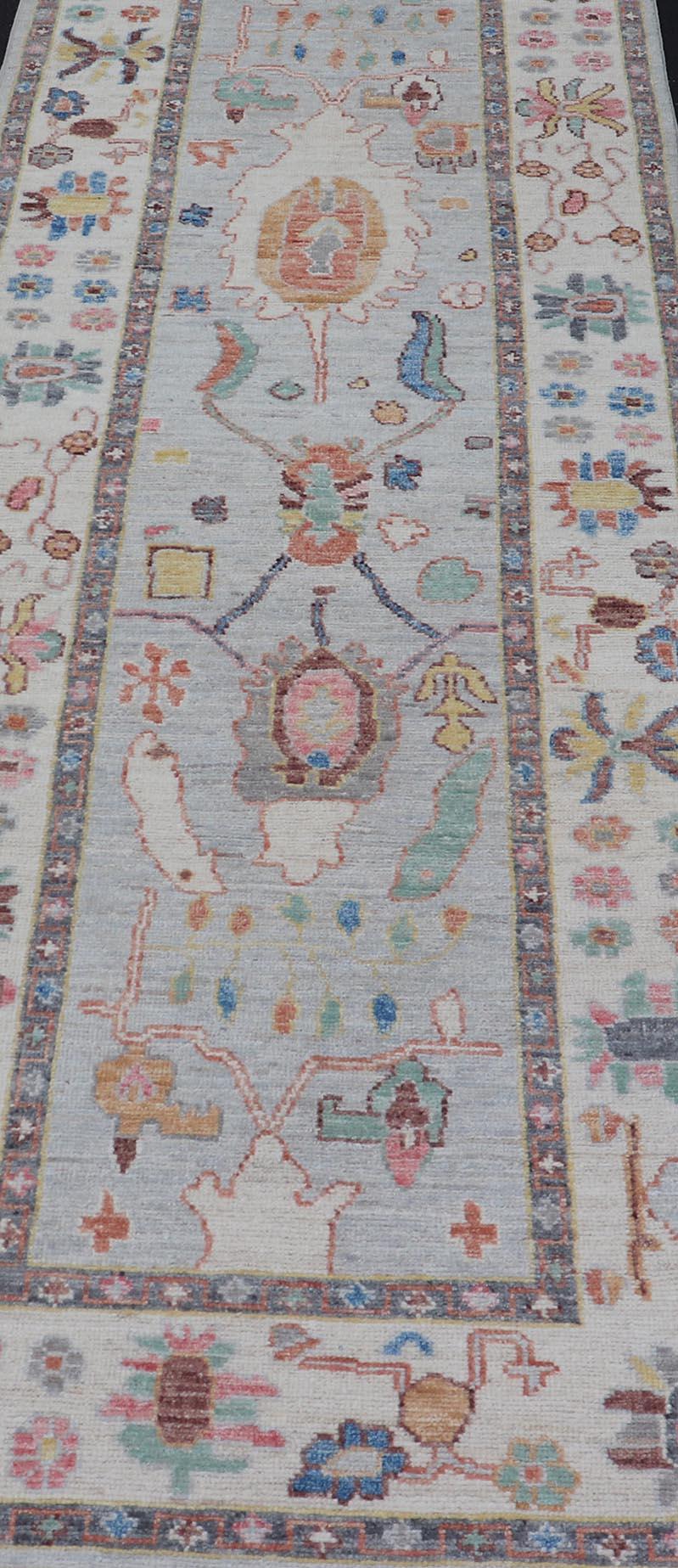 Hand-Knotted Modern Afghan Oushak Runner with Gray Background and Floral Motif For Sale