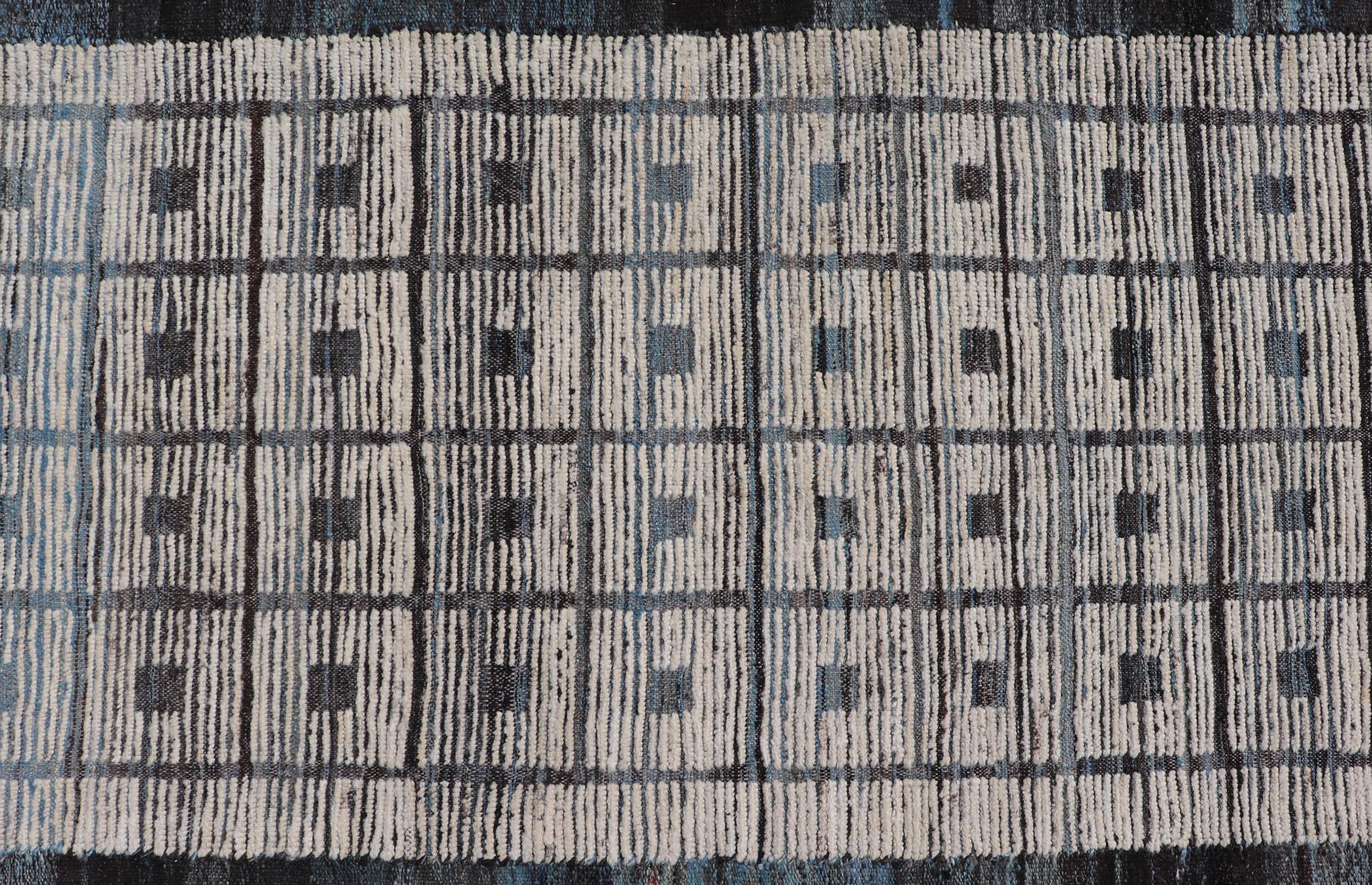 
Modern Casual Tribal Rug, Keivan Woven Arts / rug AFG-39515, country of origin / type: Afghanistan / Modern Casual, circa Early-21th Century.

Measures: 3'3 x 10'2.

This modern casual tribal rug has been hand-knotted. The rug features a modern