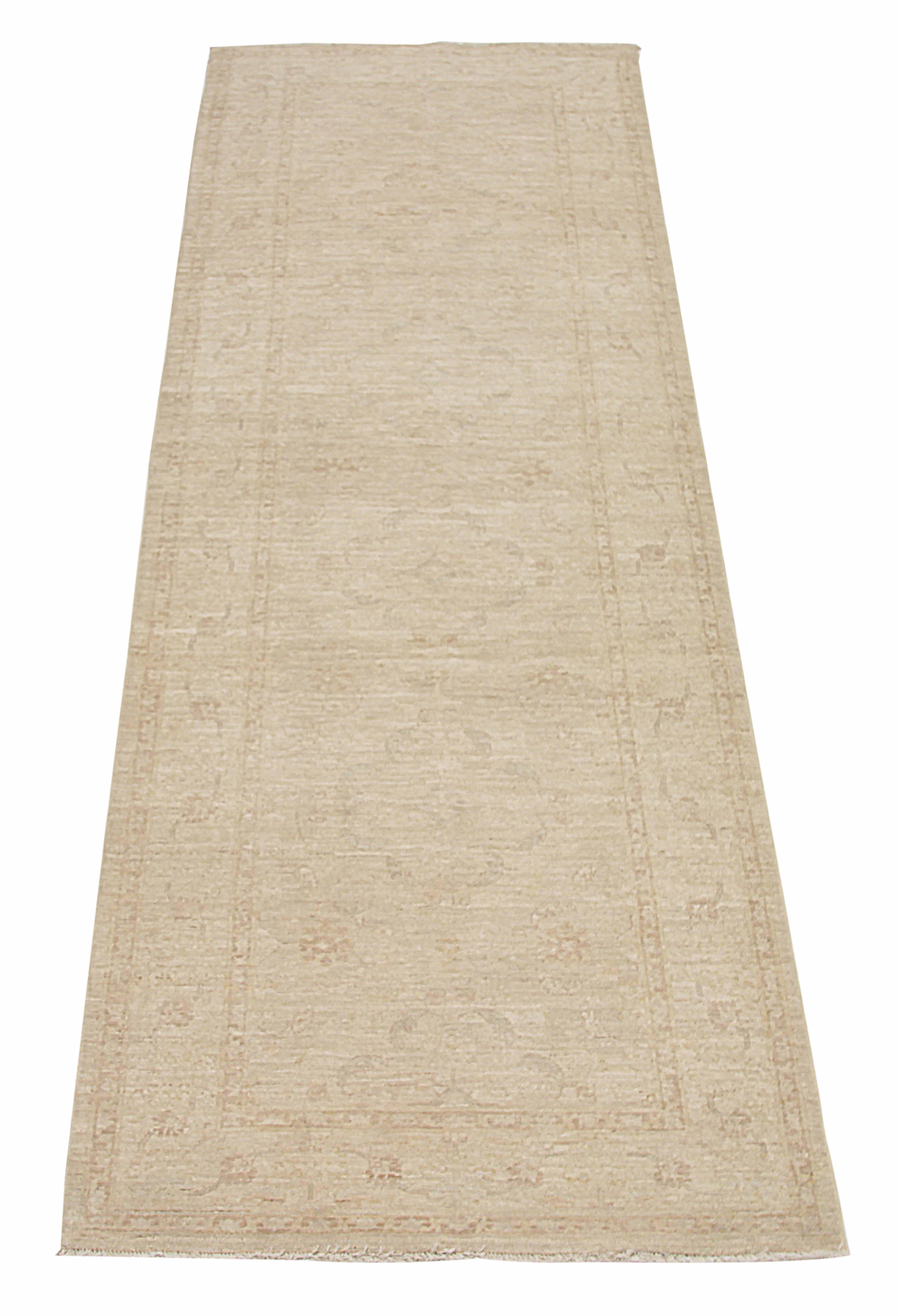 Modern Afghan runner rug handwoven from the finest sheep’s wool. It’s colored with all-natural vegetable dyes that are safe for humans and pets. It’s a traditional Tabriz design handwoven by expert artisans. It’s a lovely area rug that can be