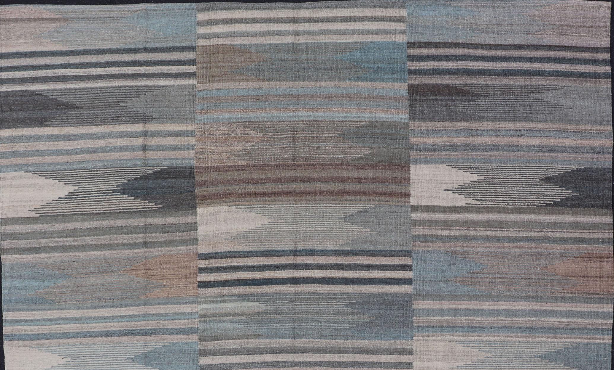 blue, gray, brown checkered Kilim Modern rug with Kilim, Keivan Woven Arts / rug AFG-203, country of origin / type: Afghanistan / Kilim, condition: new

This brand new rug features a modern checkered design and a flat-woven composition. The color