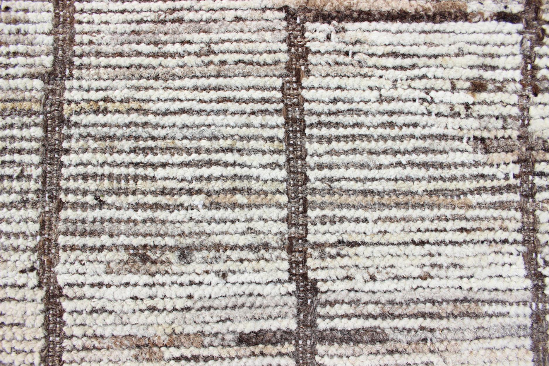 Contemporary Modern Afghanistan Rug in Neutral Tones with Subdued Design with Pops of Blue For Sale