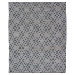 Alfombra moderna afgana con estampado integral en tonos apagados y diseño azul