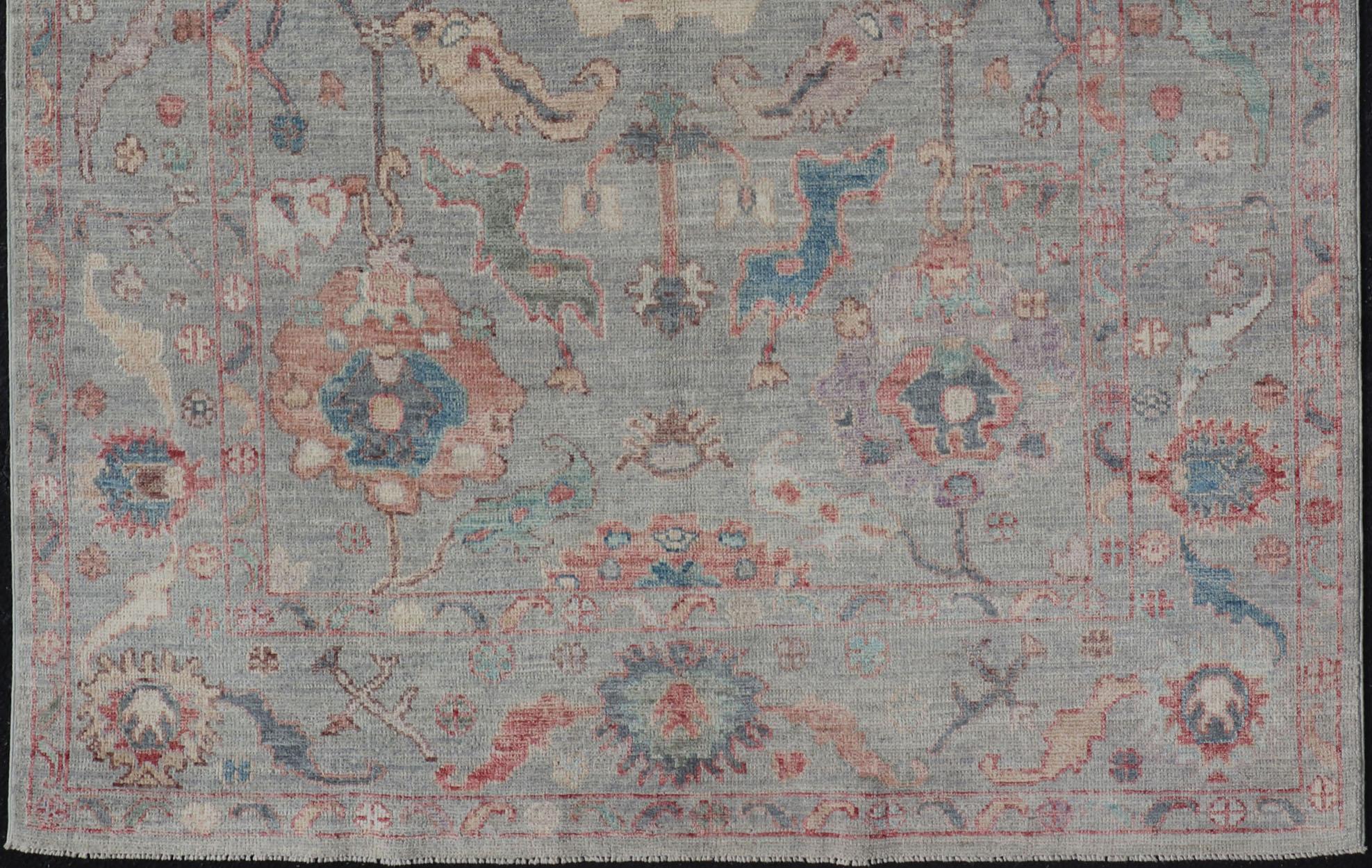 Wool Modern All-Over Floral Oushak with a Light Blue-Gray Background and Multi-Color For Sale