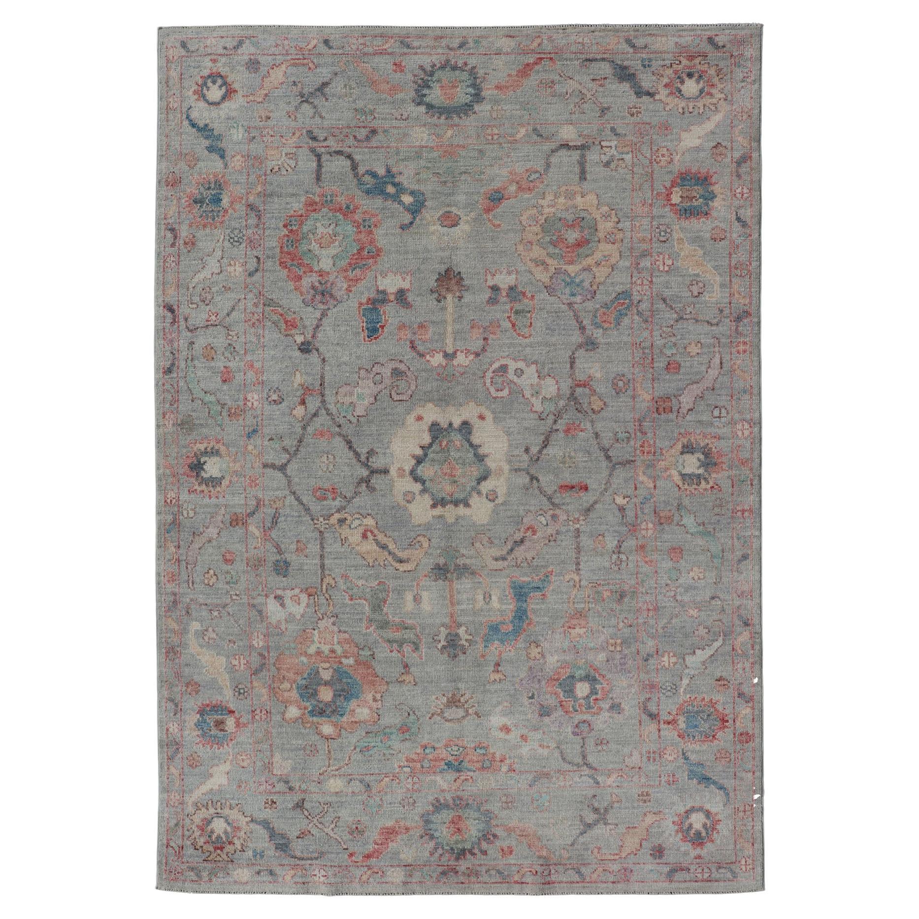 Modern All-Over Floral Oushak with a Light Blue-Gray Background and Multi-Color