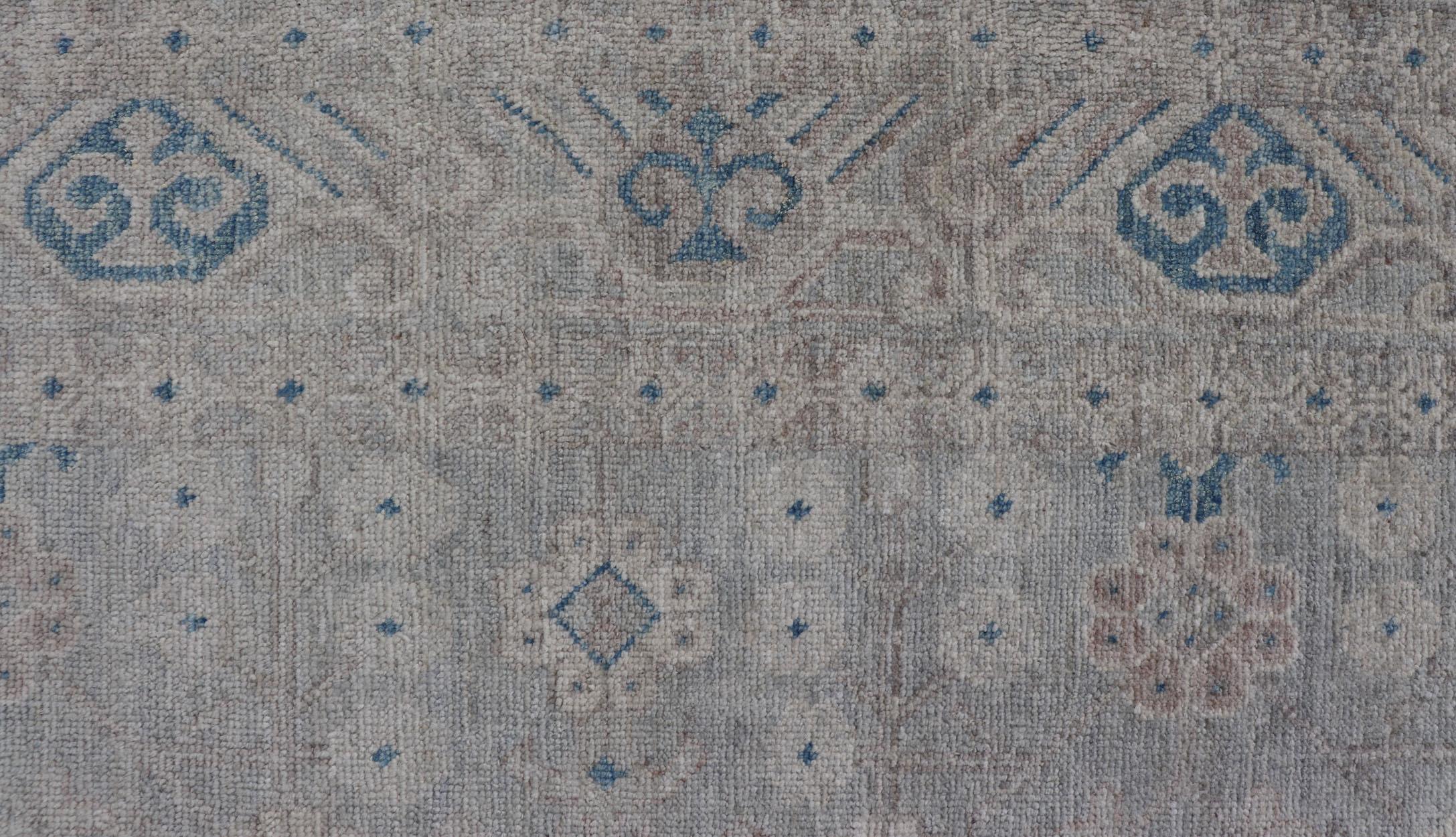 Hand-Knotted Modern All-Over Modern Khotan Rug with Light Background and Blue Colors For Sale