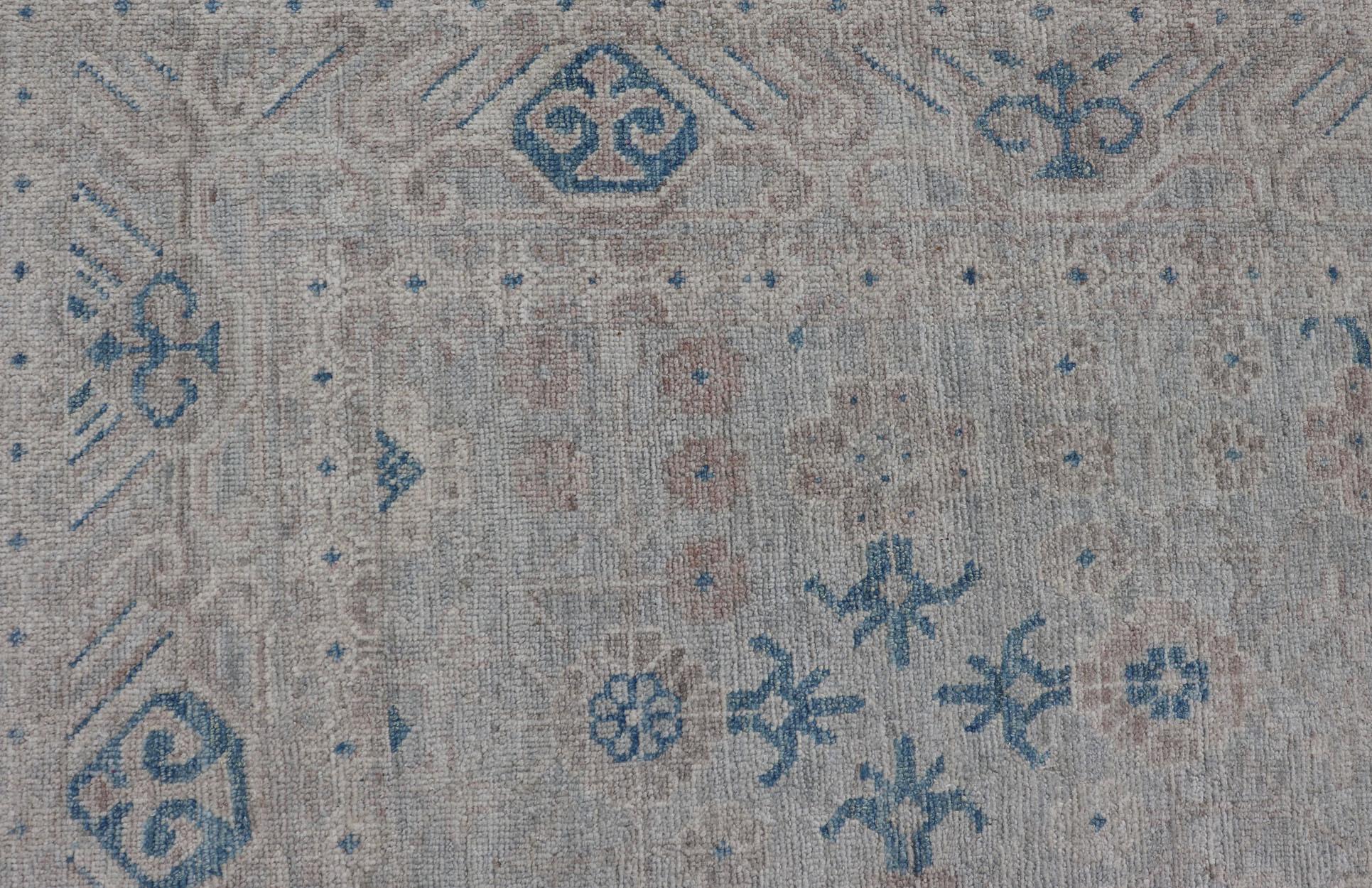Modern All-Over Modern Khotan Rug with Light Background and Blue Colors In New Condition For Sale In Atlanta, GA