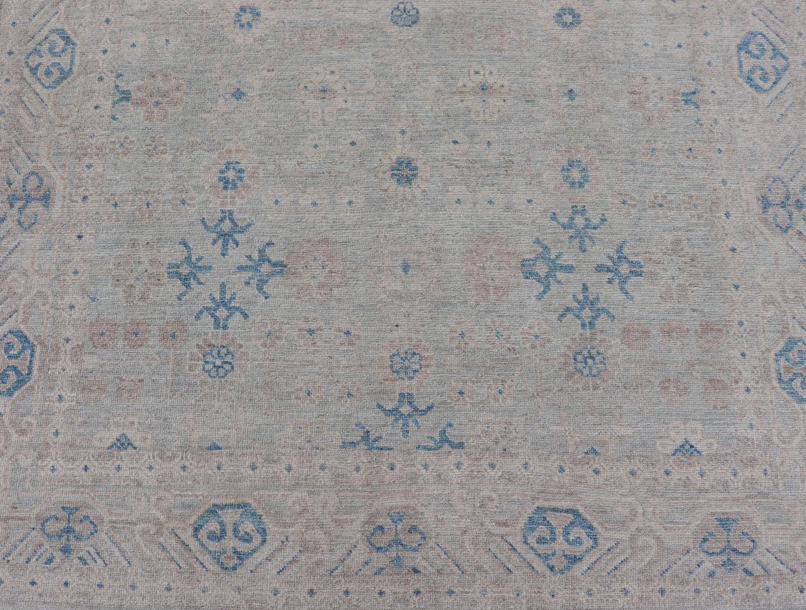 Contemporary Modern All-Over Modern Khotan Rug with Light Background and Blue Colors For Sale
