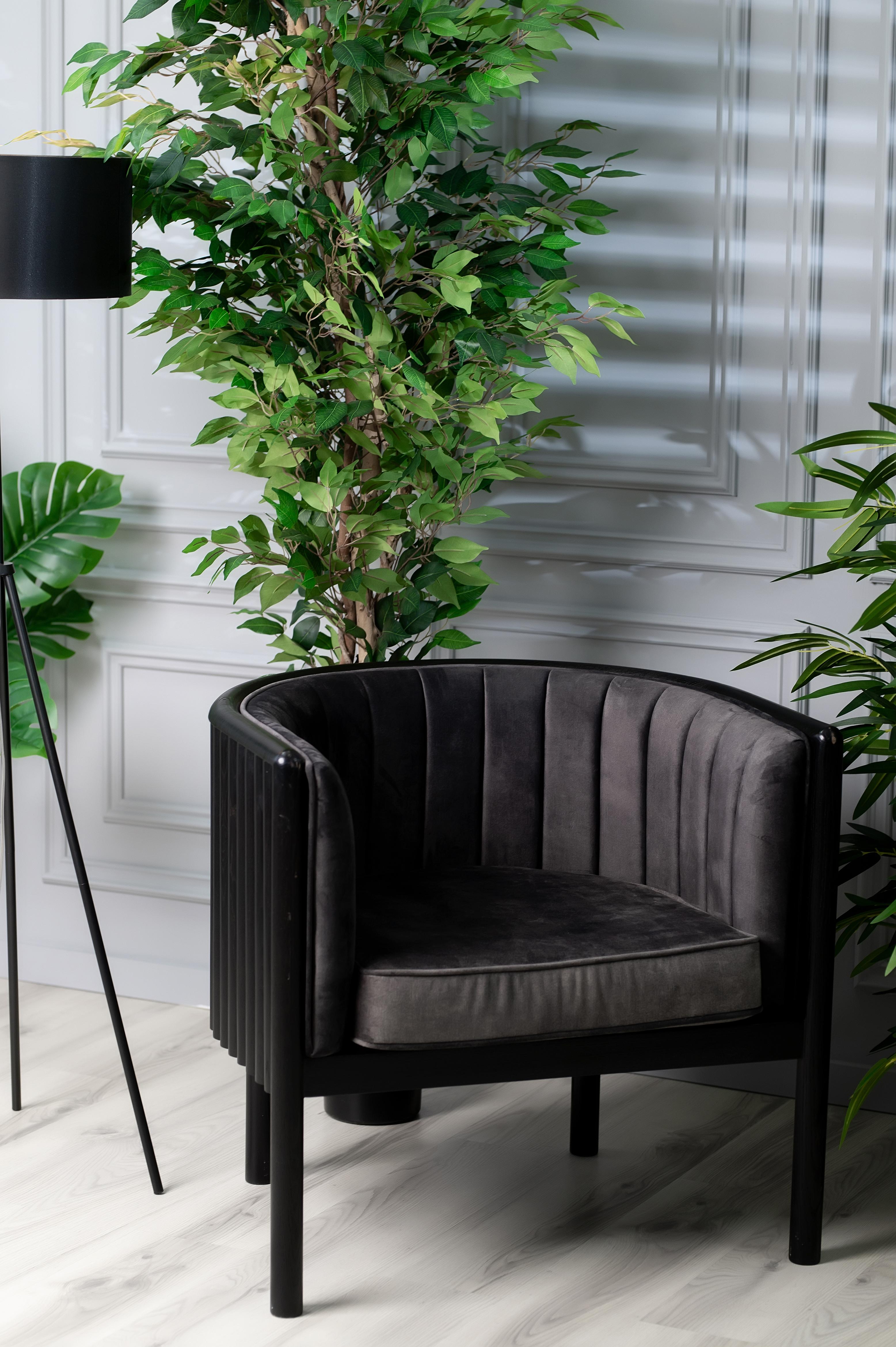 The Alton armchair is the definition of Mid-Century Modern furniture. The cylinder backings offer a unique look that isn’t duplicated in the furniture space. The emerald seat covering add a simple elegance to the piece. The comfort level will