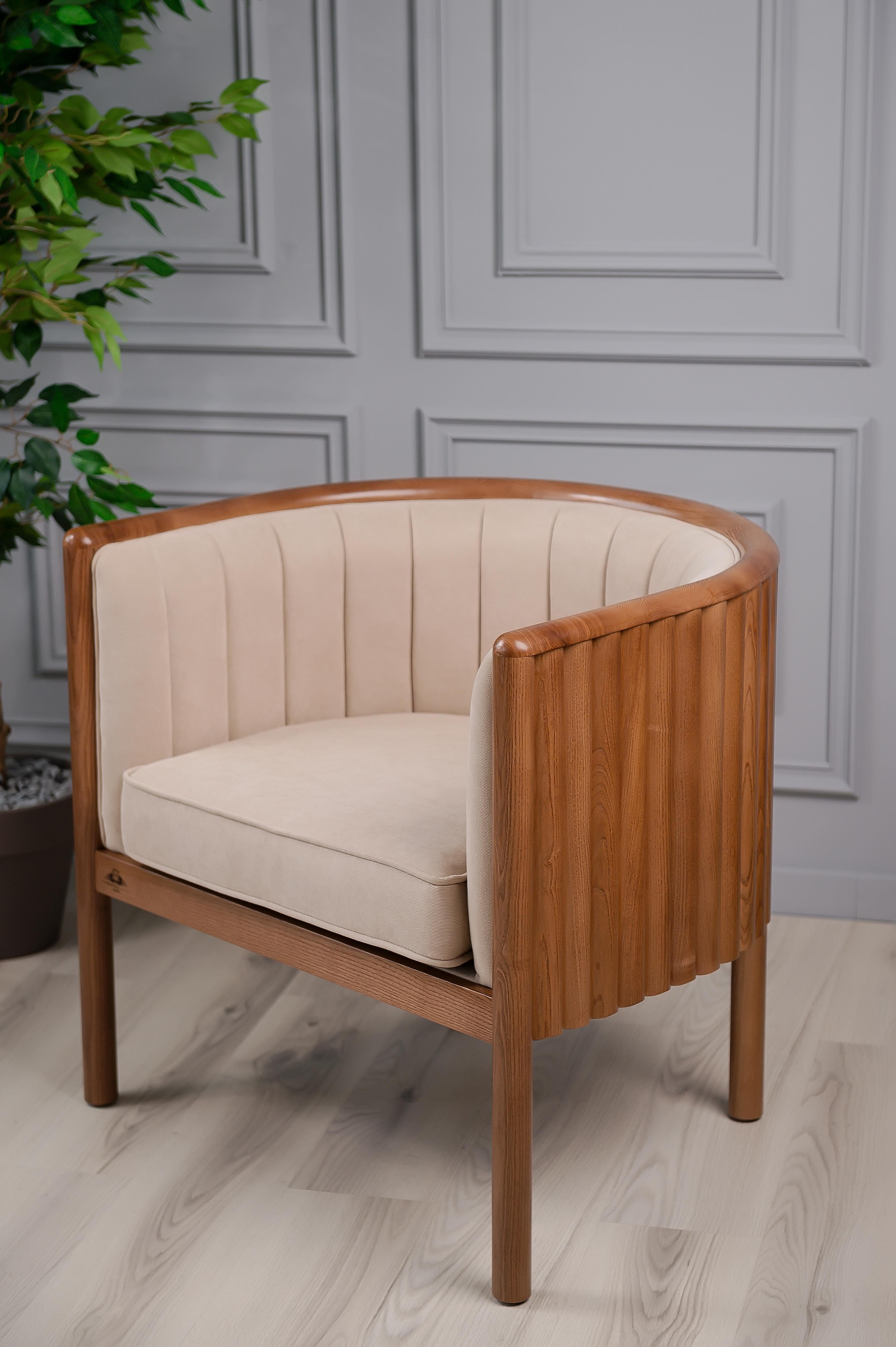 The Alton armchair is the definition of Mid-Century Modern furniture. The cylinder backings offer a unique look that isn’t duplicated in the furniture space. The emerald seat covering add a simple elegance to the piece. The comfort level will