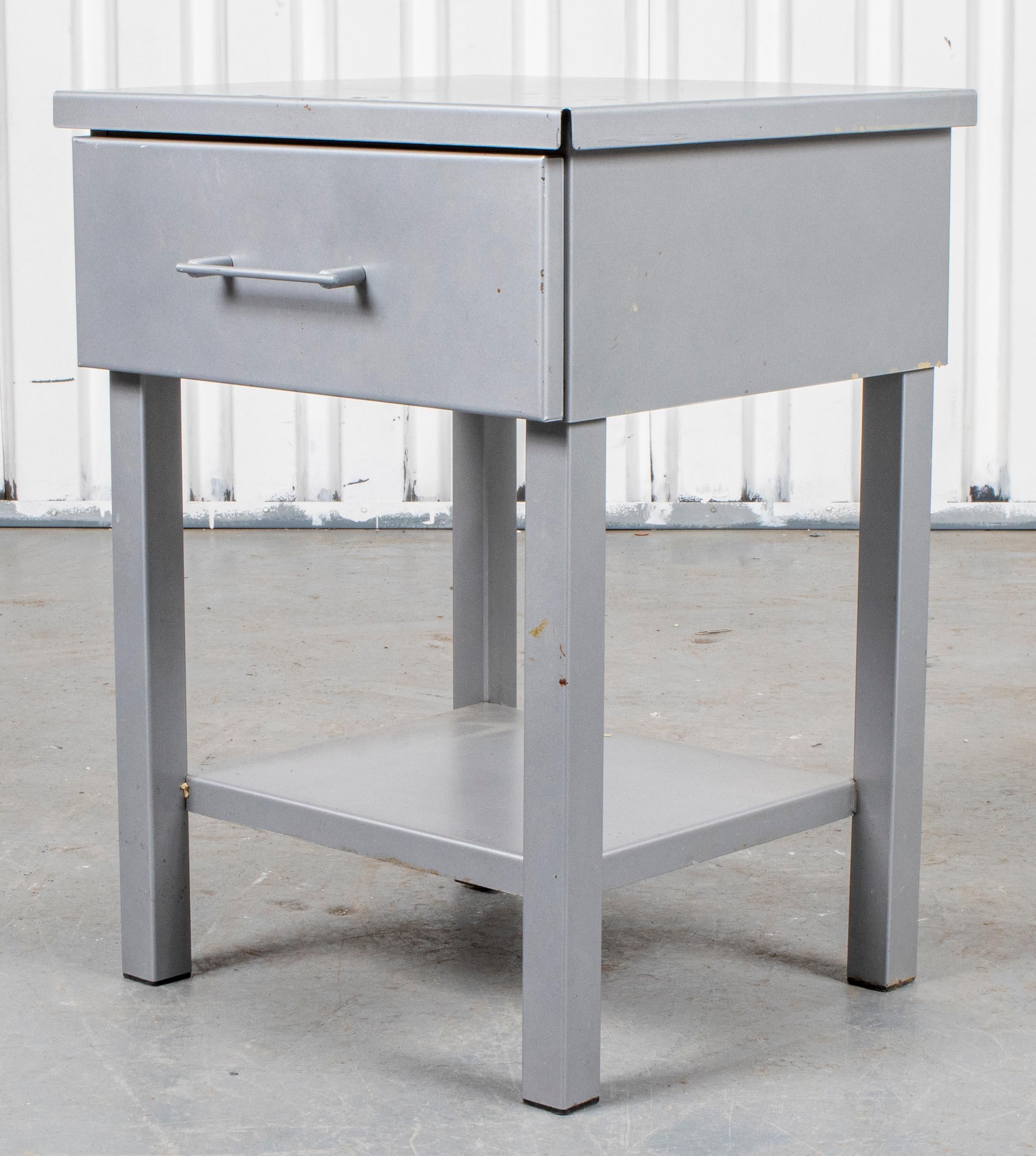 Modern aluminum side table with single drawer.