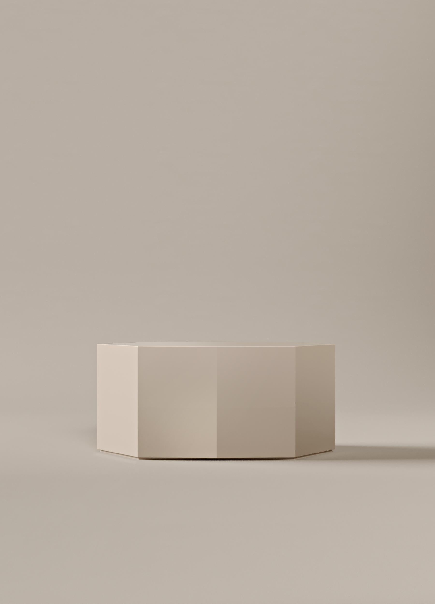 Ame III Coffee Table by Zoe Wolker

14.2″ H × 17.3″ W × 31.5″ L

Ivory Lacquered MDF

A sculptural coffee table that balances bold geometry with everyday functionality. Its lacquered MDF surface reflects light with subtle depth, highlighting the