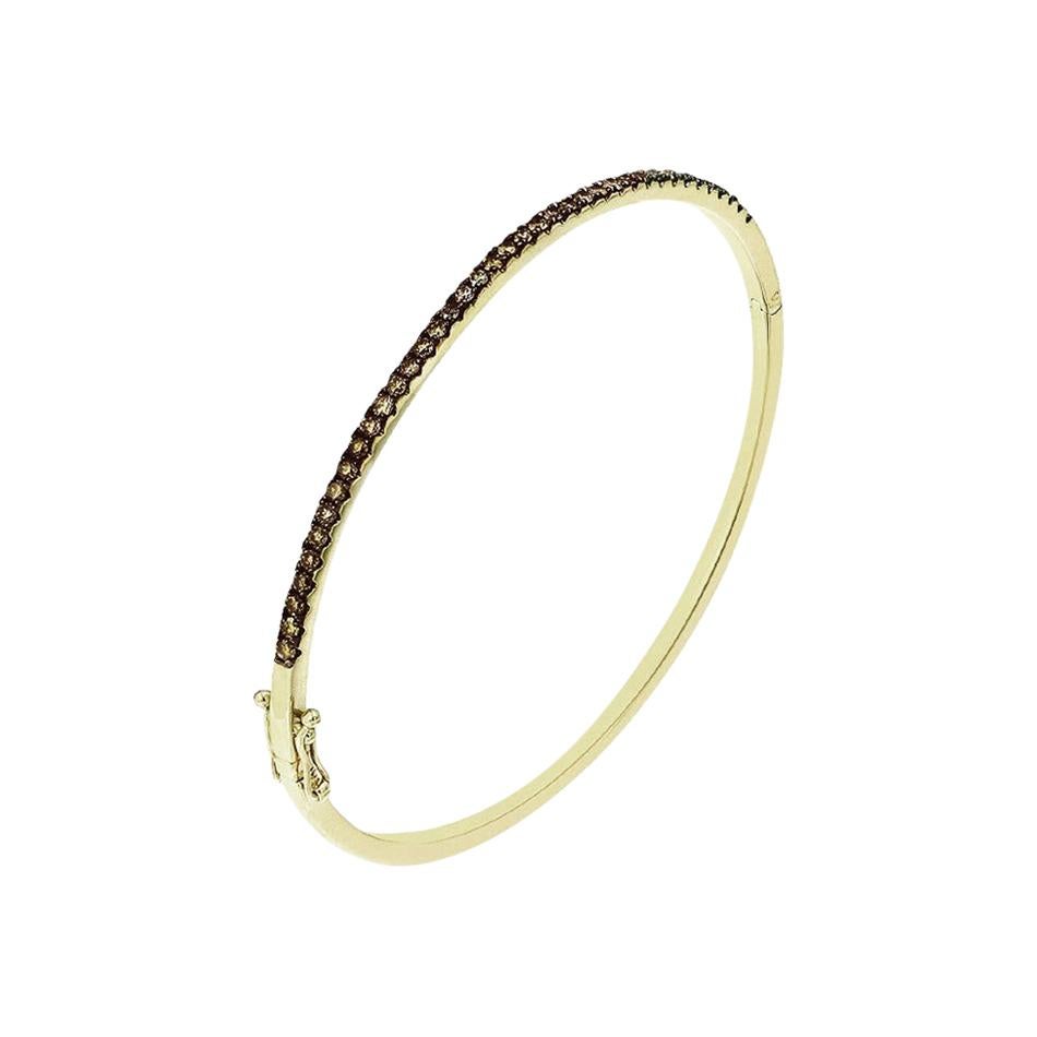 Bracelet jonc moderne et chic en or jaune avec diamants de haute joaillerie