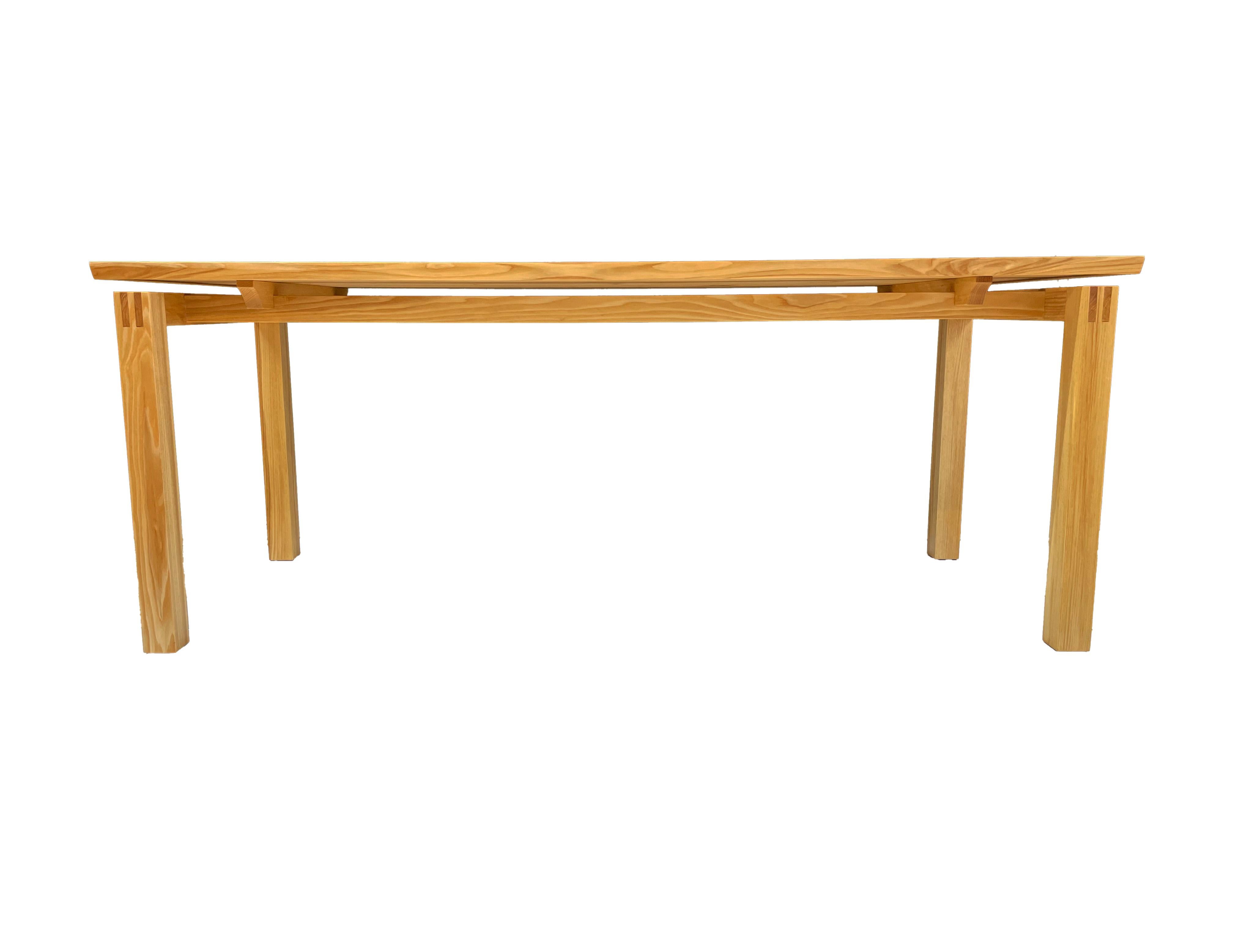 This beautiful and modern dining table is handmade by us. The connection of the legs is a mortise and tenon connection. 

The table is also suitable as a desk.

On request, the table is available in different woods, dimensions and surfaces. In the