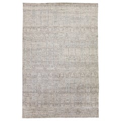 Tappeto moderno in lana beige della collezione Safi di Apadana, fatto a mano e con disegni a trifoglio