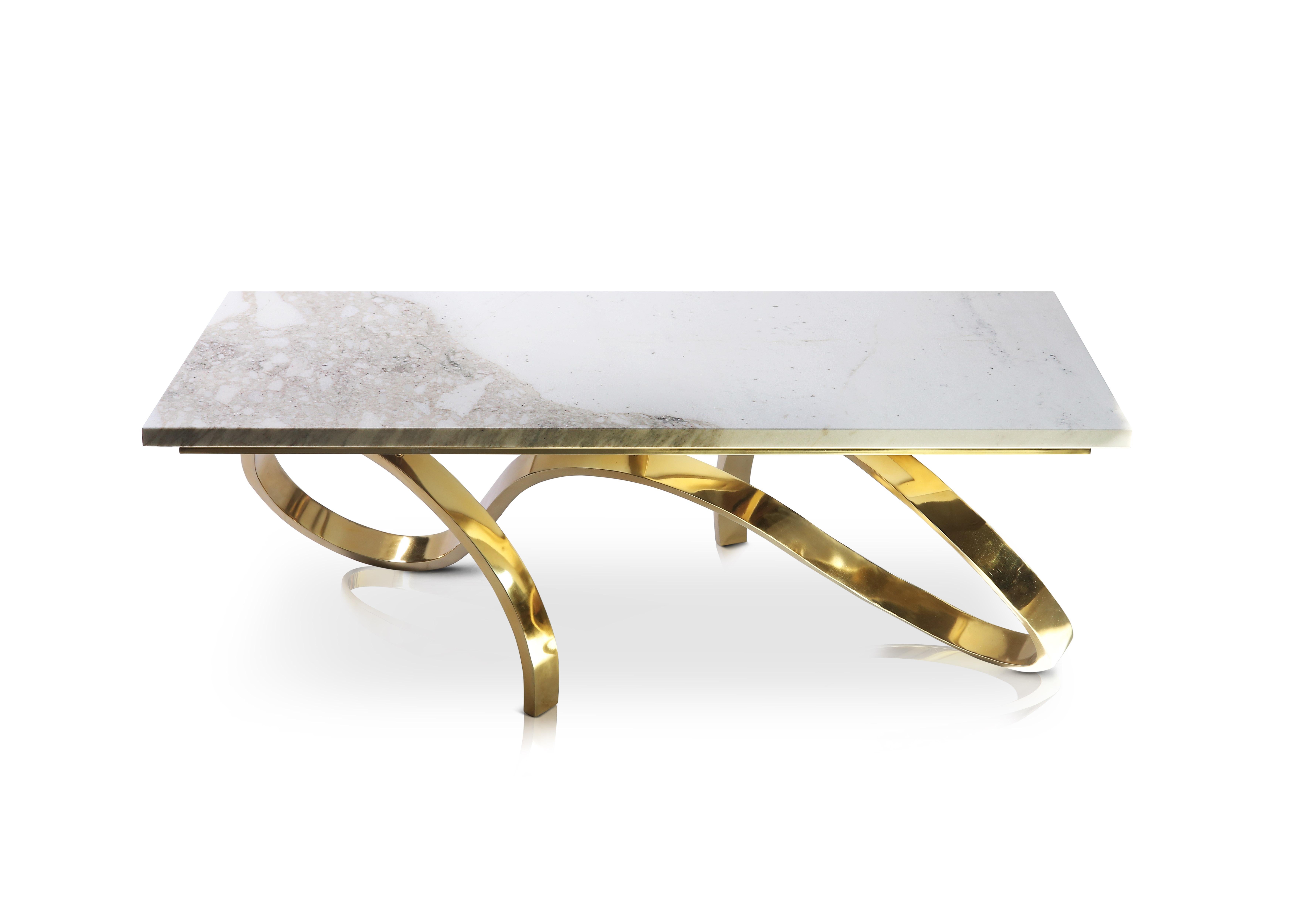 The contemporary marble and gold finish coffee table, providing a perfect modern design for any interior.
This design features a high gloss marble tabletop supported by a contrasting stainless steel base in a polished gold finish. Measures: Height
