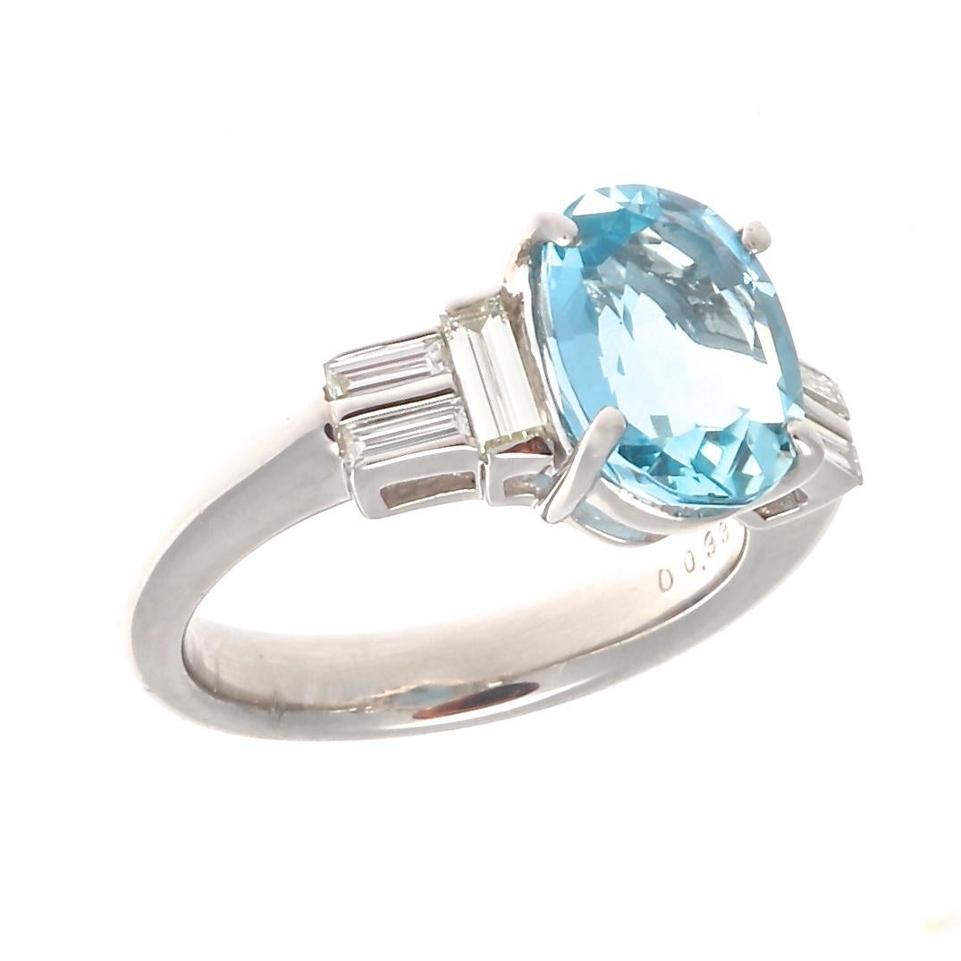 Serene, fresh and sparkling like the ocean. Believed to be the treasure of mermaids and the stone of eternal youth. Featuring a 2.19 carat oval cut aquamarine that is accented by perpendicularly set baguette cut diamonds. Crafted in platinum. Ring